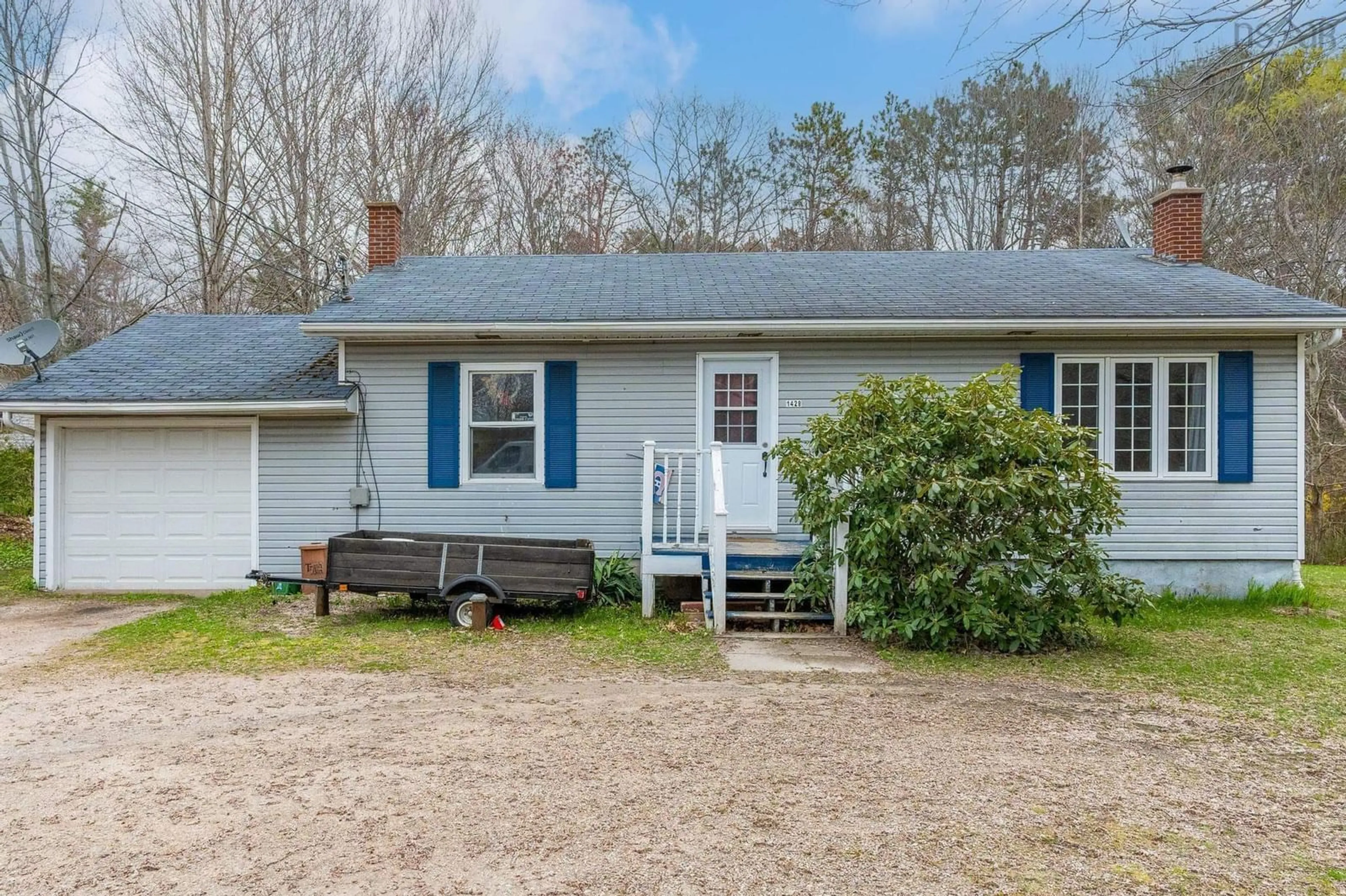 Home with vinyl exterior material, street for 1428 Bridge St, Kingston Nova Scotia B0P 1R0