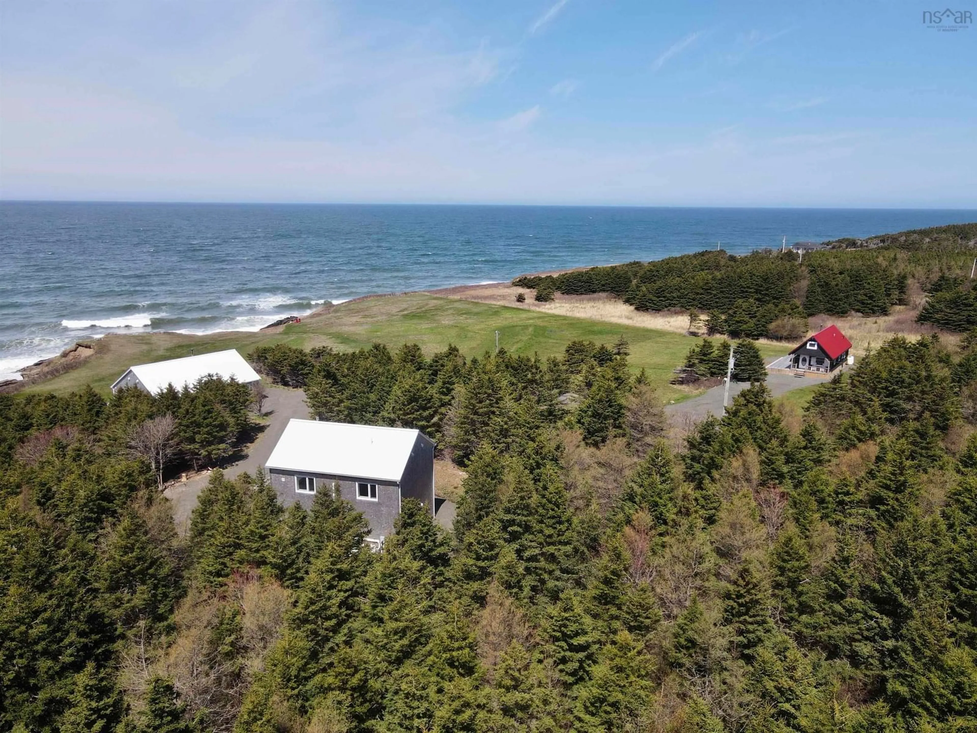 A pic from outside/outdoor area/front of a property/back of a property/a pic from drone, water/lake/river/ocean view for 11201 & 11203 Cabot Trail, Terre Noire Nova Scotia B0E 1C0