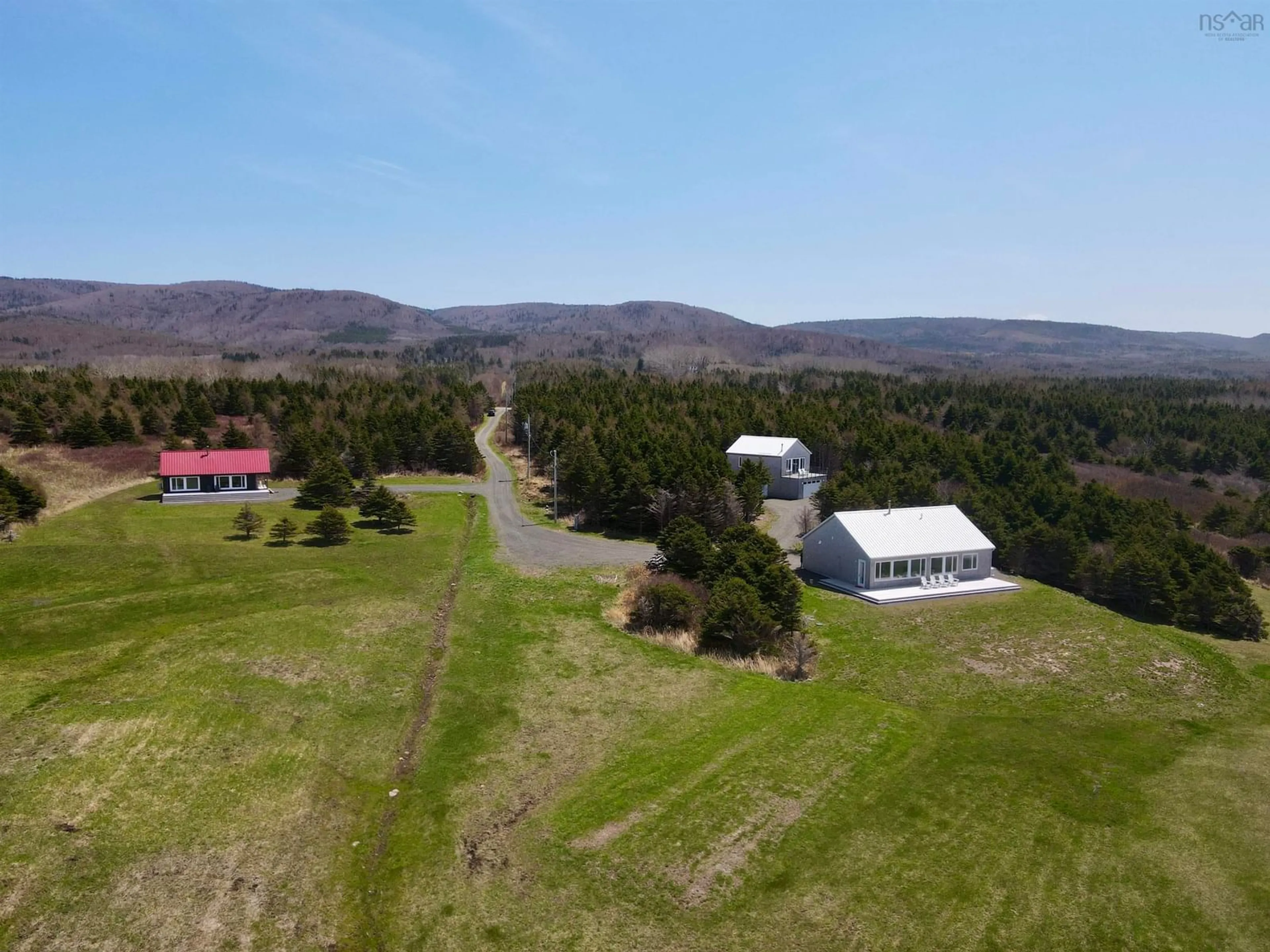 A pic from outside/outdoor area/front of a property/back of a property/a pic from drone, mountain view for 11201 & 11203 Cabot Trail, Terre Noire Nova Scotia B0E 1C0