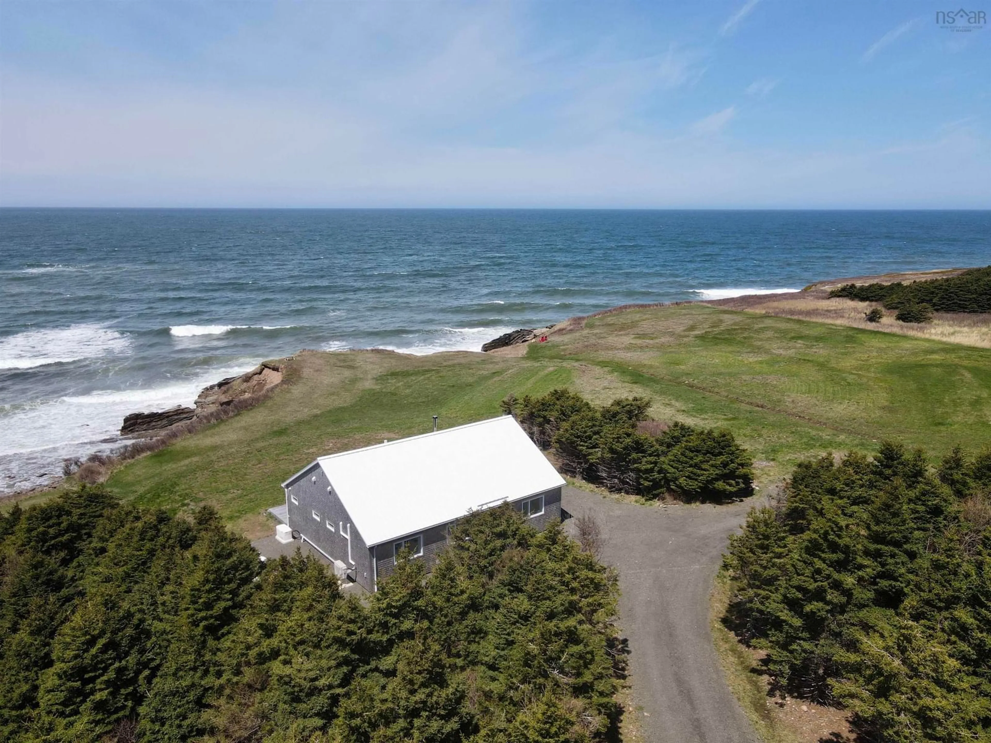 A pic from outside/outdoor area/front of a property/back of a property/a pic from drone, water/lake/river/ocean view for 11201 & 11203 Cabot Trail, Terre Noire Nova Scotia B0E 1C0