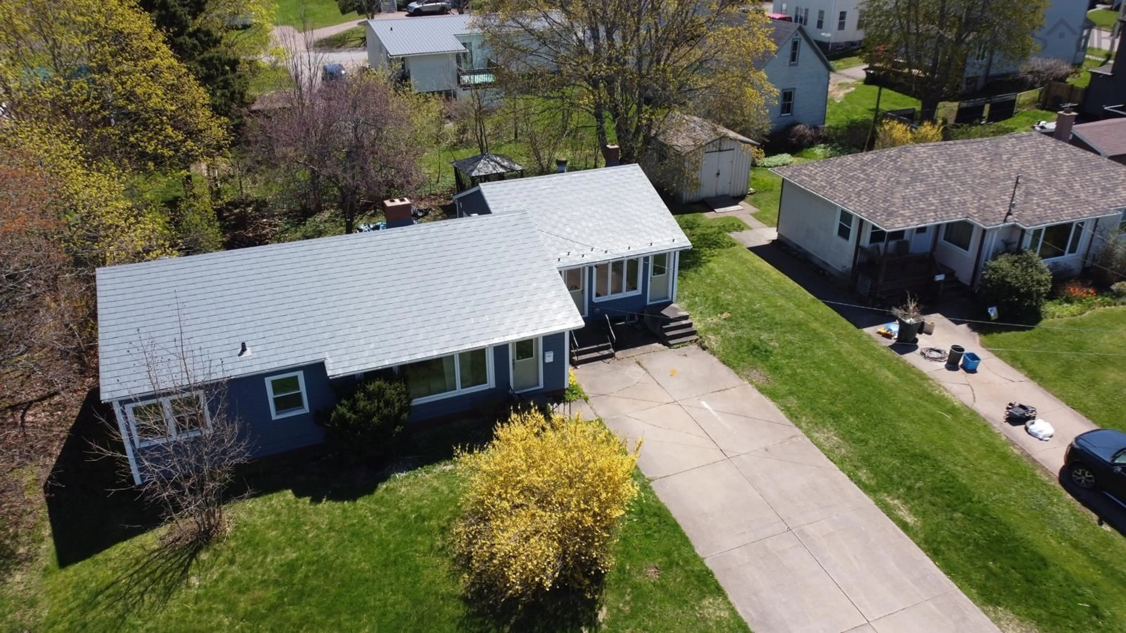 A pic from outside/outdoor area/front of a property/back of a property/a pic from drone, street for 6 Dickey St, Amherst Nova Scotia B4H 2H7