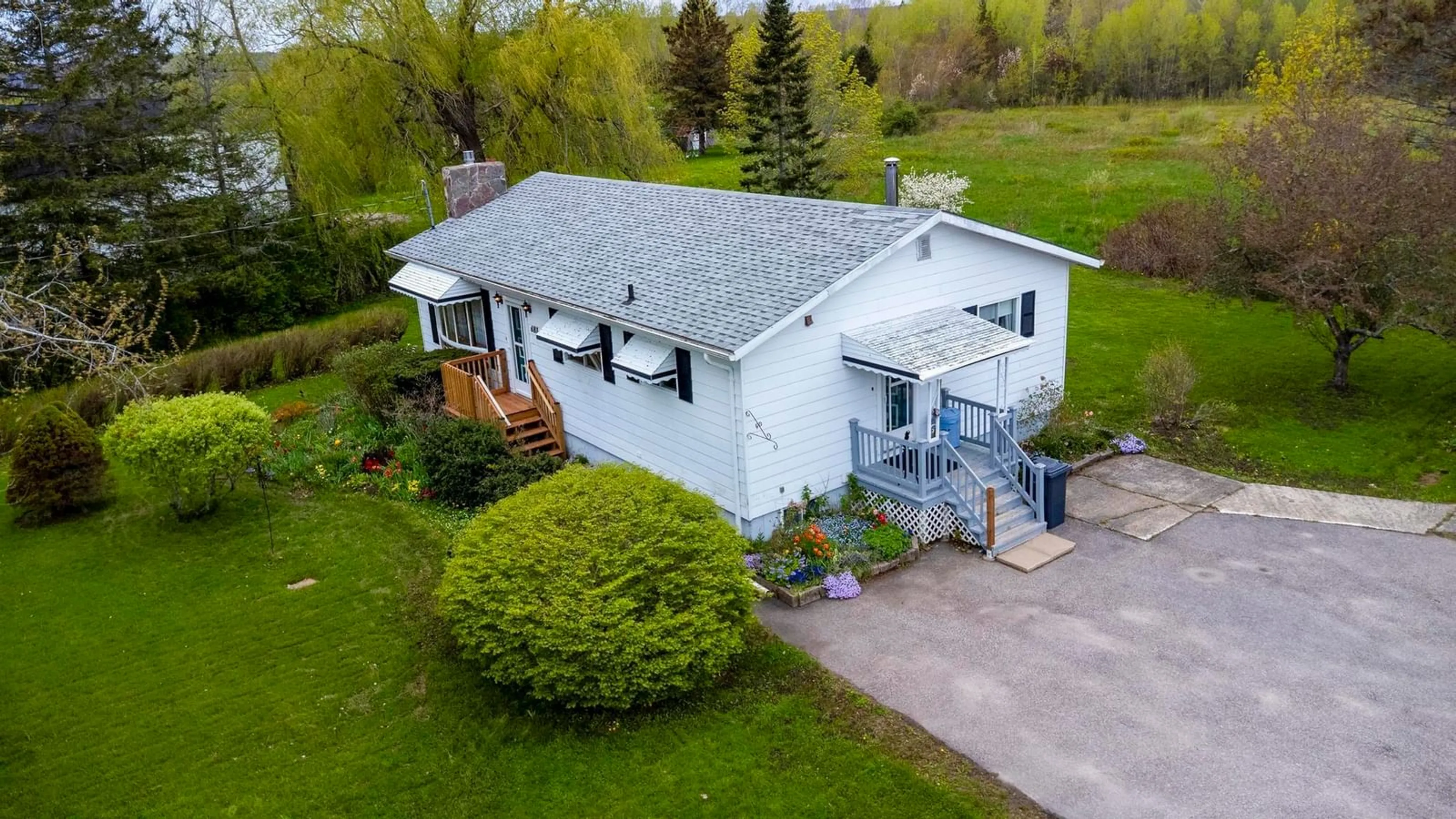 A pic from outside/outdoor area/front of a property/back of a property/a pic from drone, building for 683 Main St, Lawrencetown Nova Scotia B0S 1M0