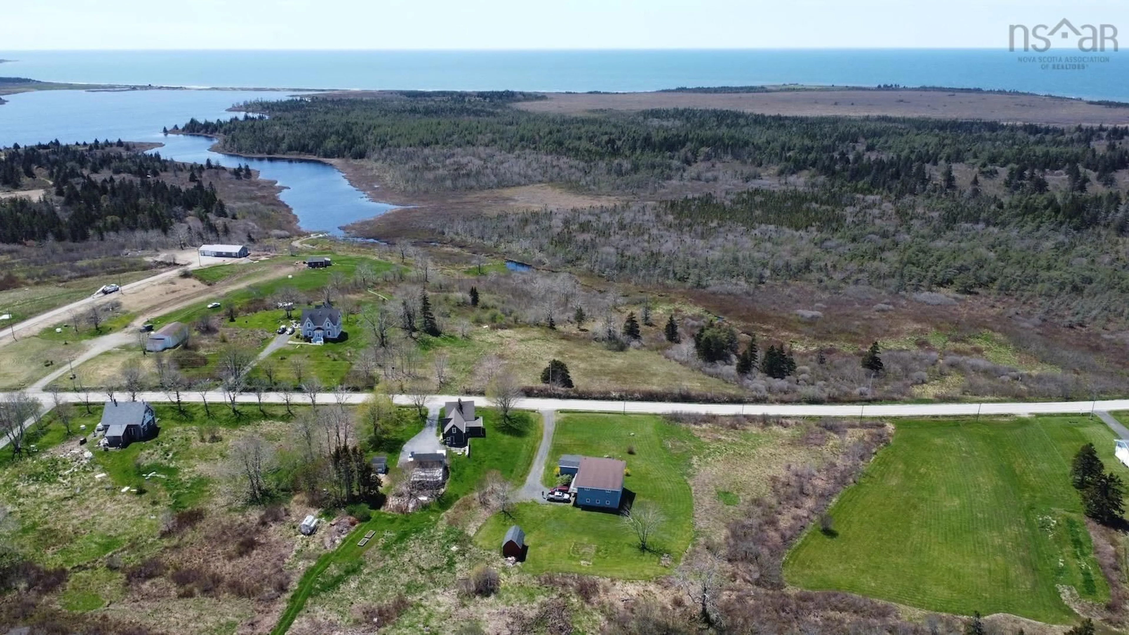 A pic from outside/outdoor area/front of a property/back of a property/a pic from drone, water/lake/river/ocean view for 4494 Highway 1 #1, Woodvale Nova Scotia B5A 5B1