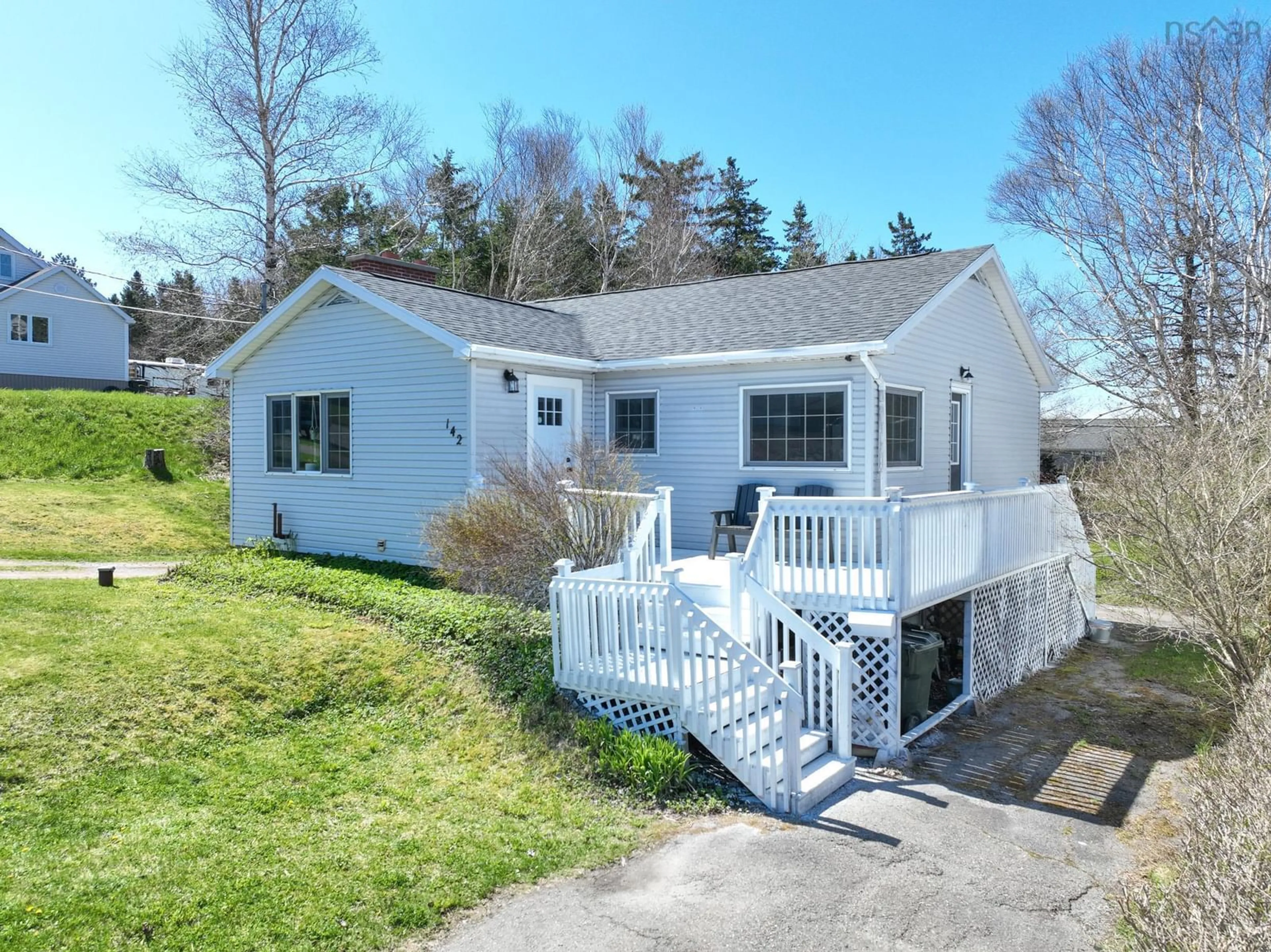 Home with vinyl exterior material, street for 142 Macrae Ave, Sydney River Nova Scotia B1S 1M2
