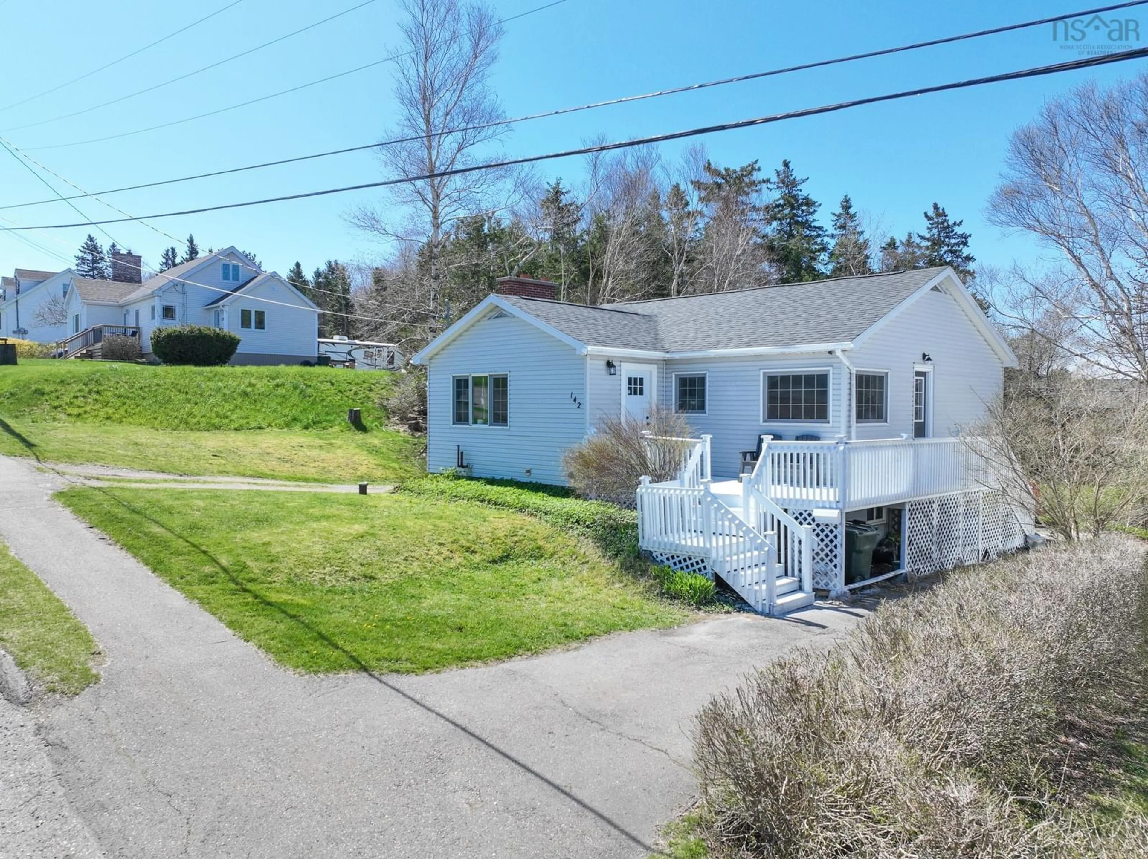 A pic from outside/outdoor area/front of a property/back of a property/a pic from drone, street for 142 Macrae Ave, Sydney River Nova Scotia B1S 1M2