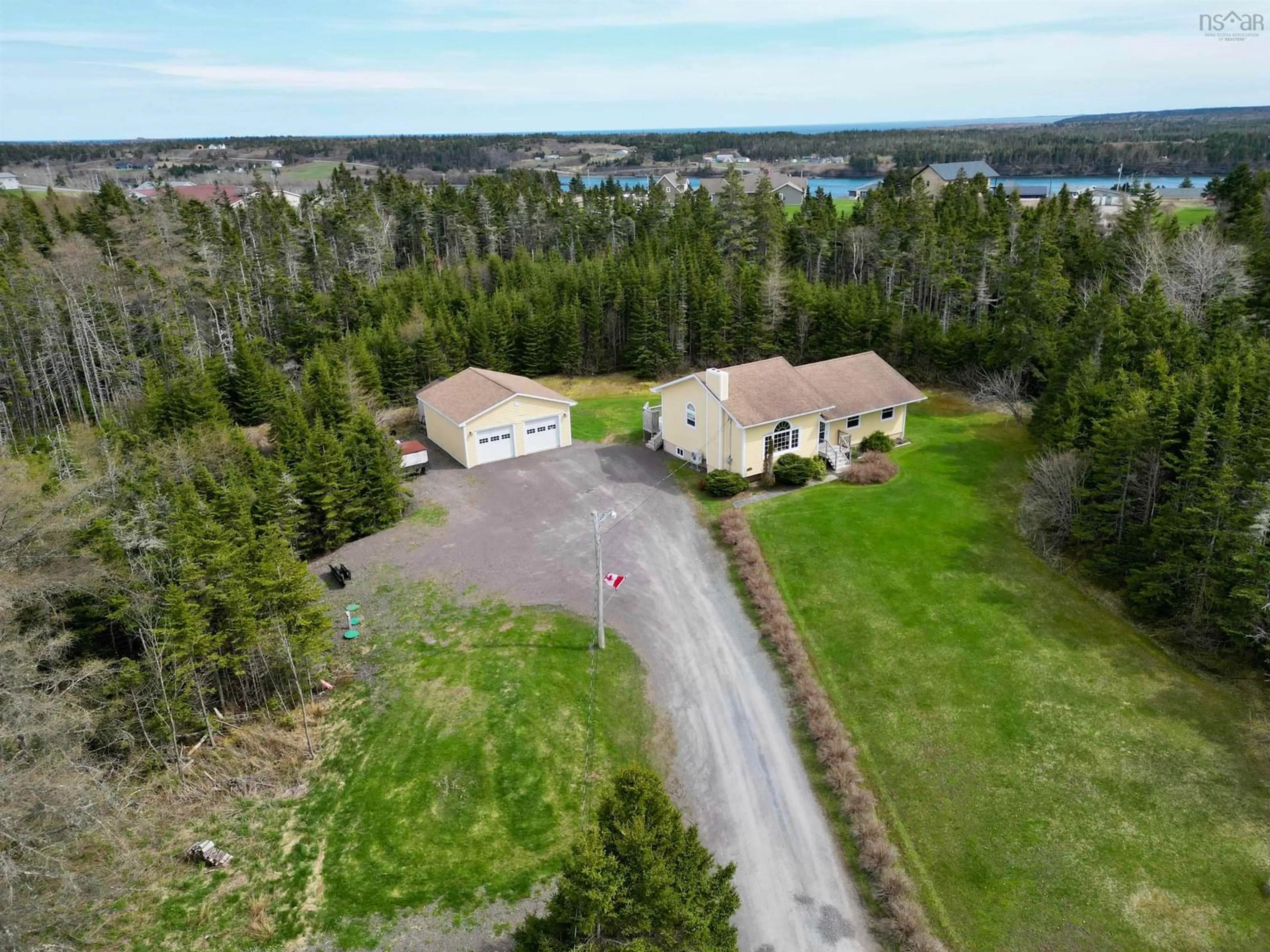 A pic from outside/outdoor area/front of a property/back of a property/a pic from drone, water/lake/river/ocean view for 5105 Highway 320, Arichat Nova Scotia B0E 1A0