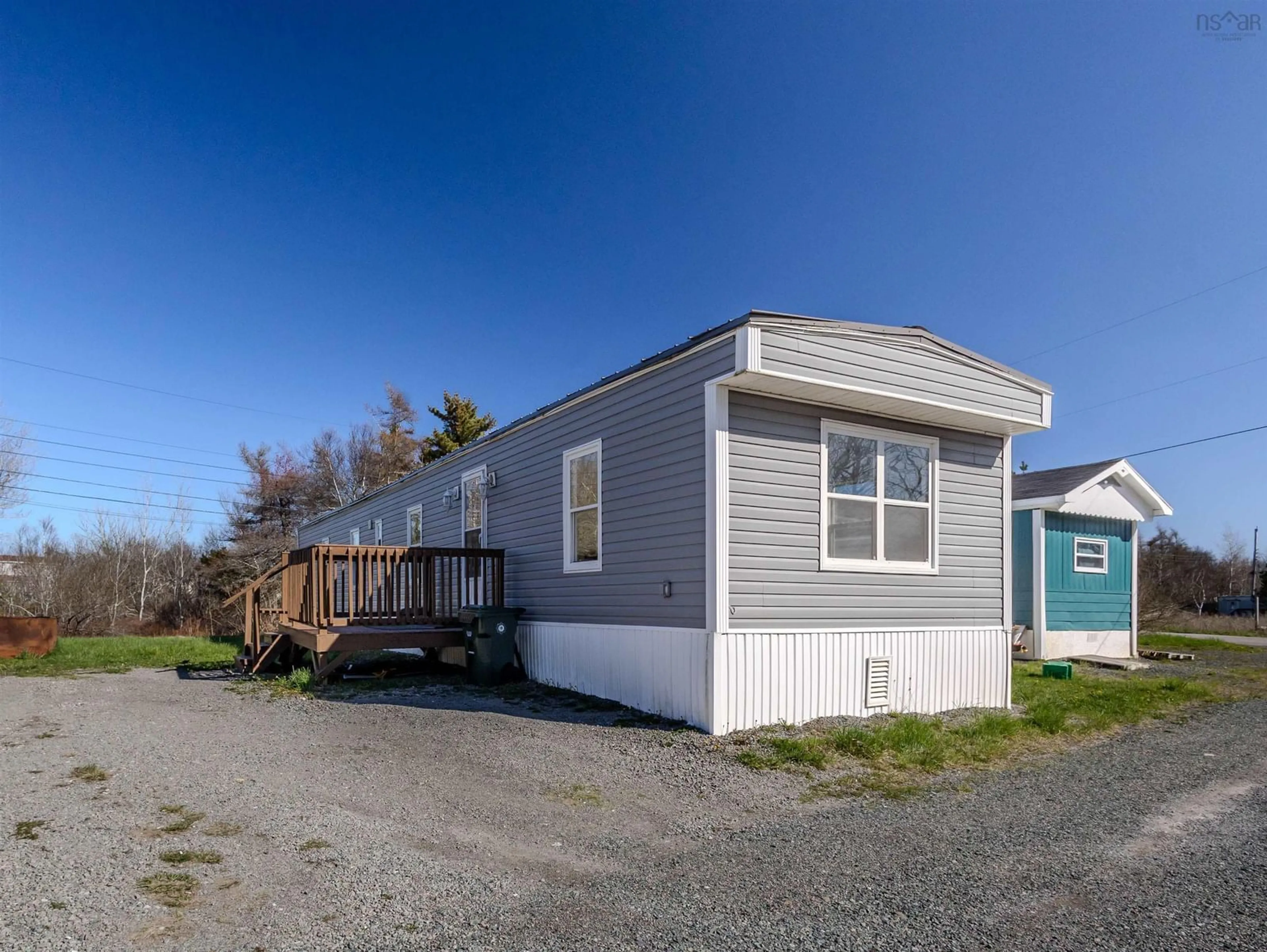 Home with vinyl exterior material, street for 17 Glenesk Trailer Park Rd, Reserve Mines Nova Scotia B1E 1B8