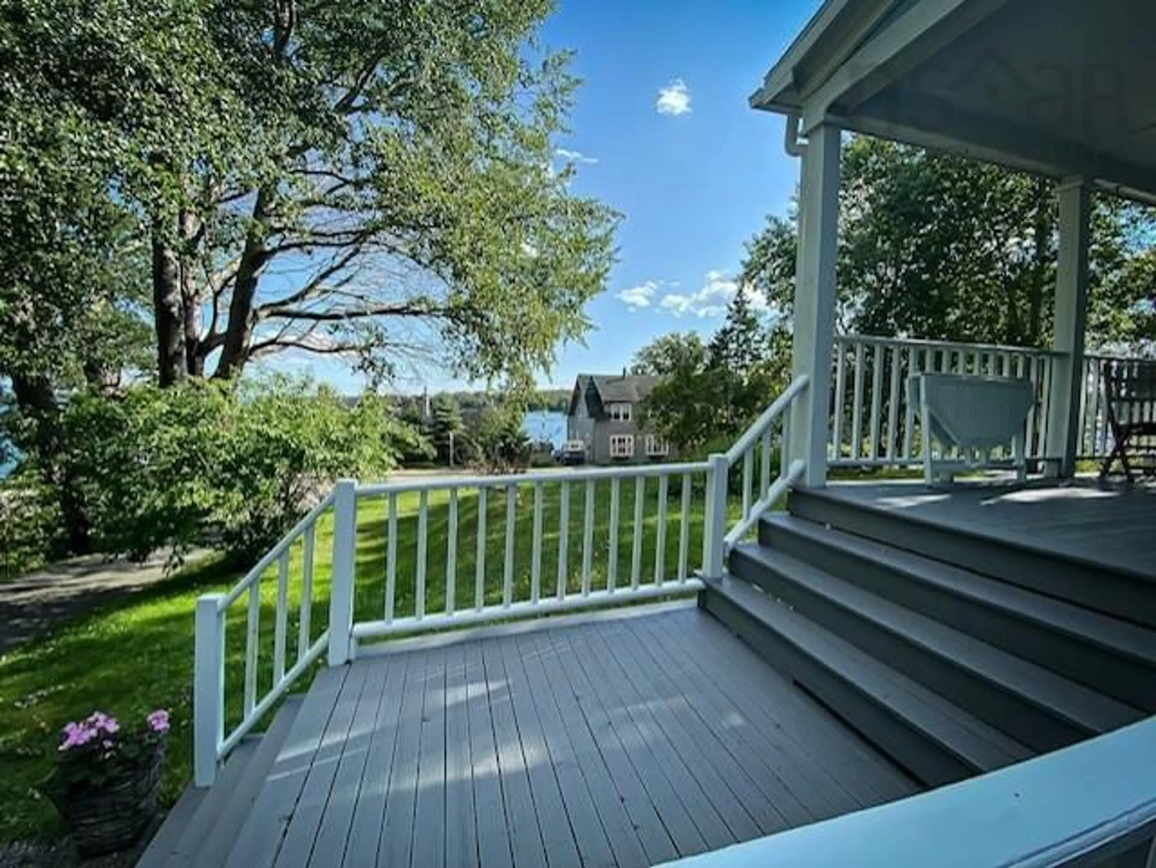 A pic from outside/outdoor area/front of a property/back of a property/a pic from drone, water/lake/river/ocean view for 555 Chebucto, Baddeck Nova Scotia B0E 1B0