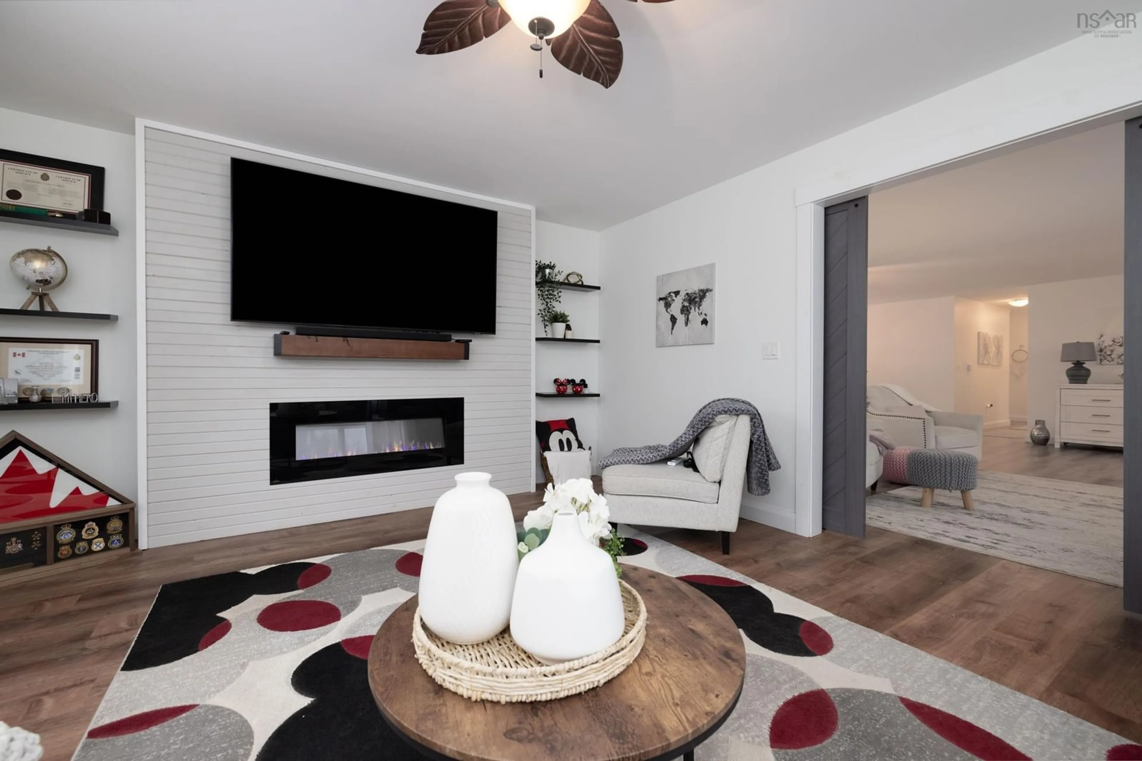 Living room with furniture, wood/laminate floor for 60 Muir Drive, Ellershouse Nova Scotia B0N 1L0