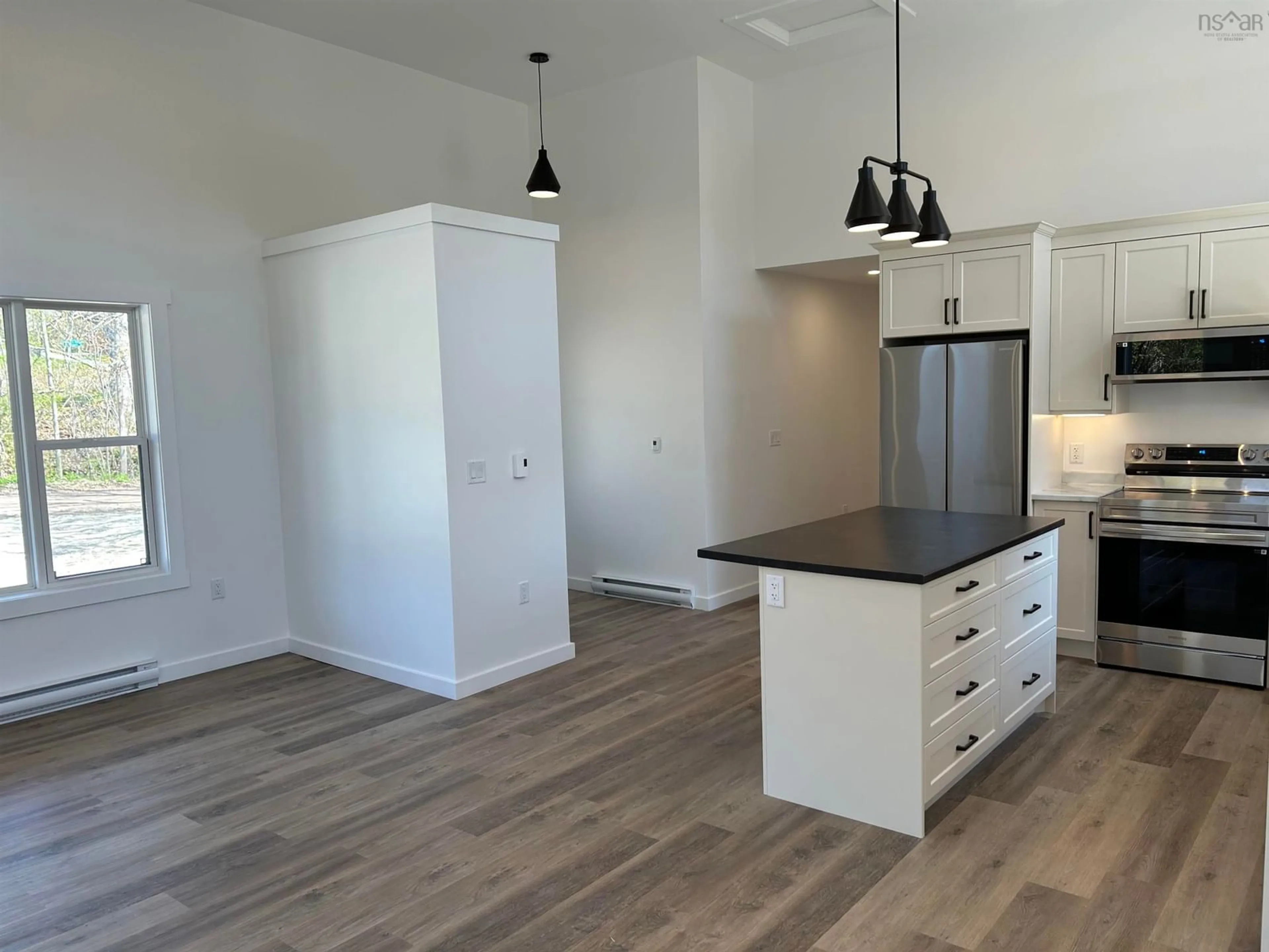 Open concept kitchen, wood/laminate floor for 14 Loop Rd, Gays River Nova Scotia B4G 2A1