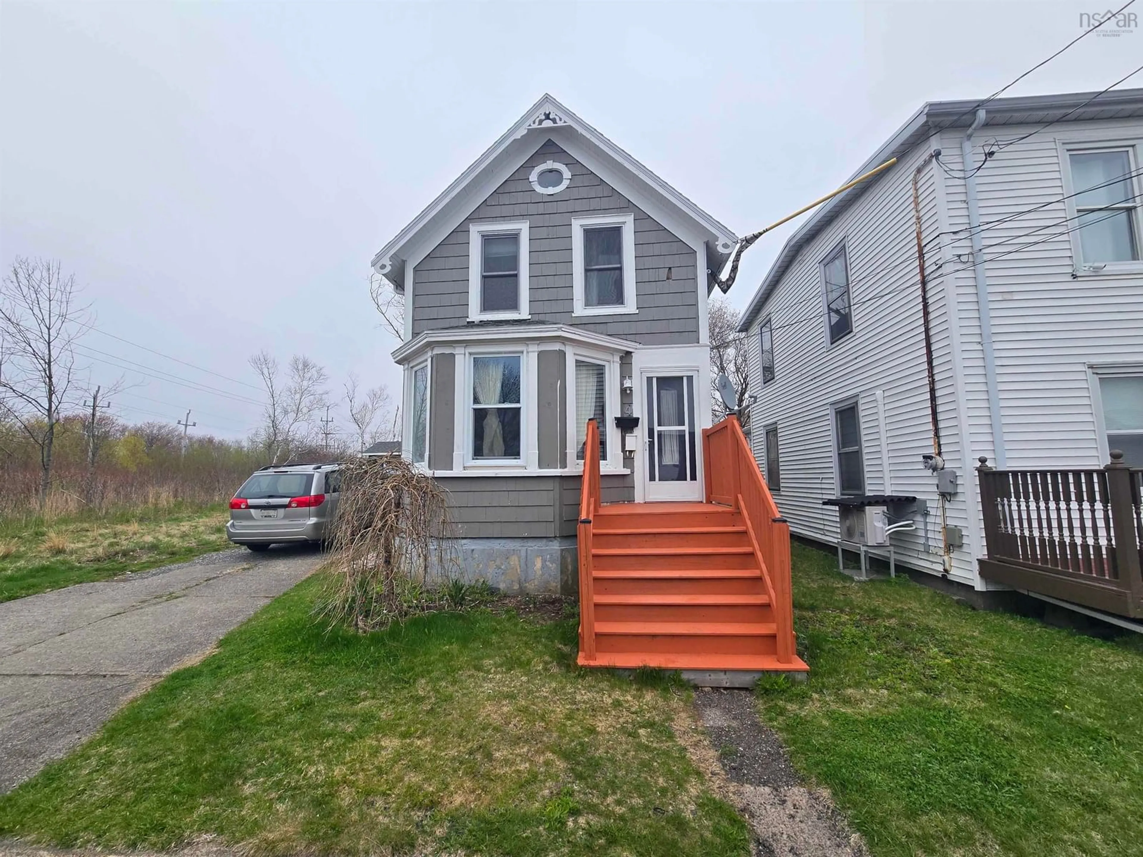 A pic from outside/outdoor area/front of a property/back of a property/a pic from drone, street for 4 Ash St, Sydney Nova Scotia B1P 3B9