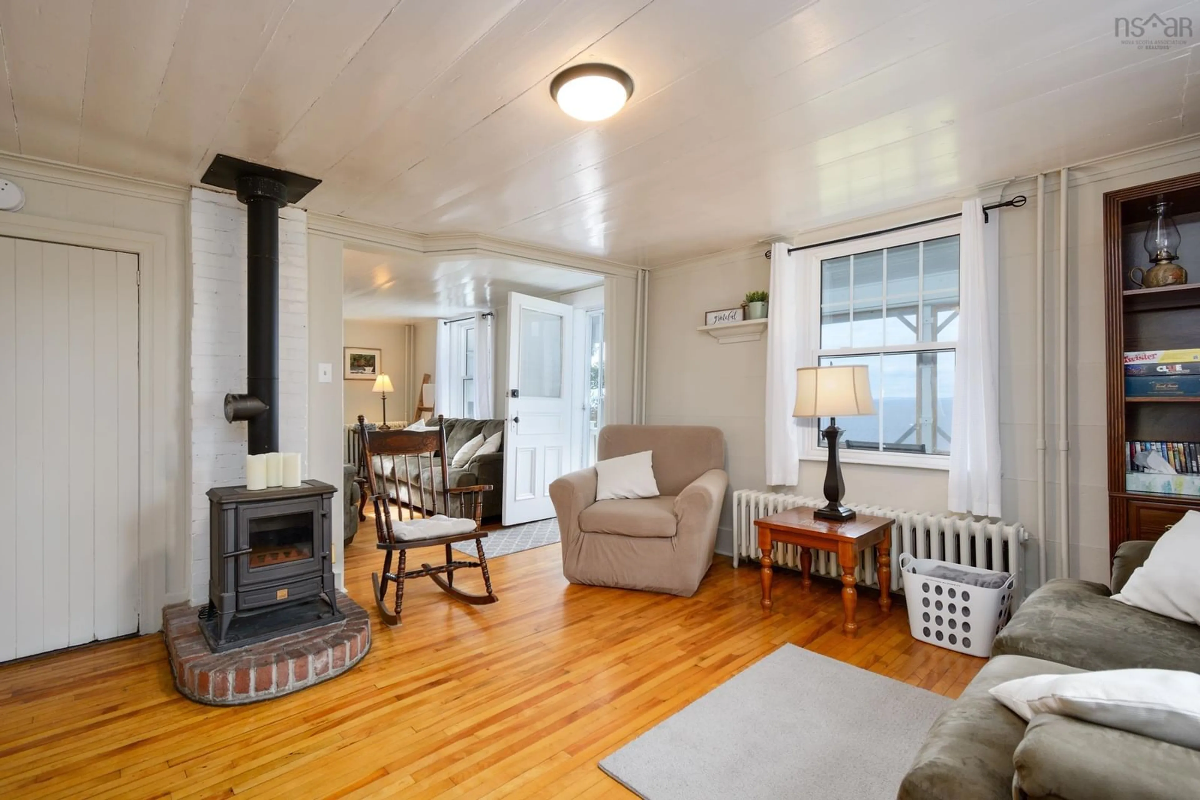 Living room with furniture, wood/laminate floor for 15398 Highway 4, Johnstown Nova Scotia B0E 3B0