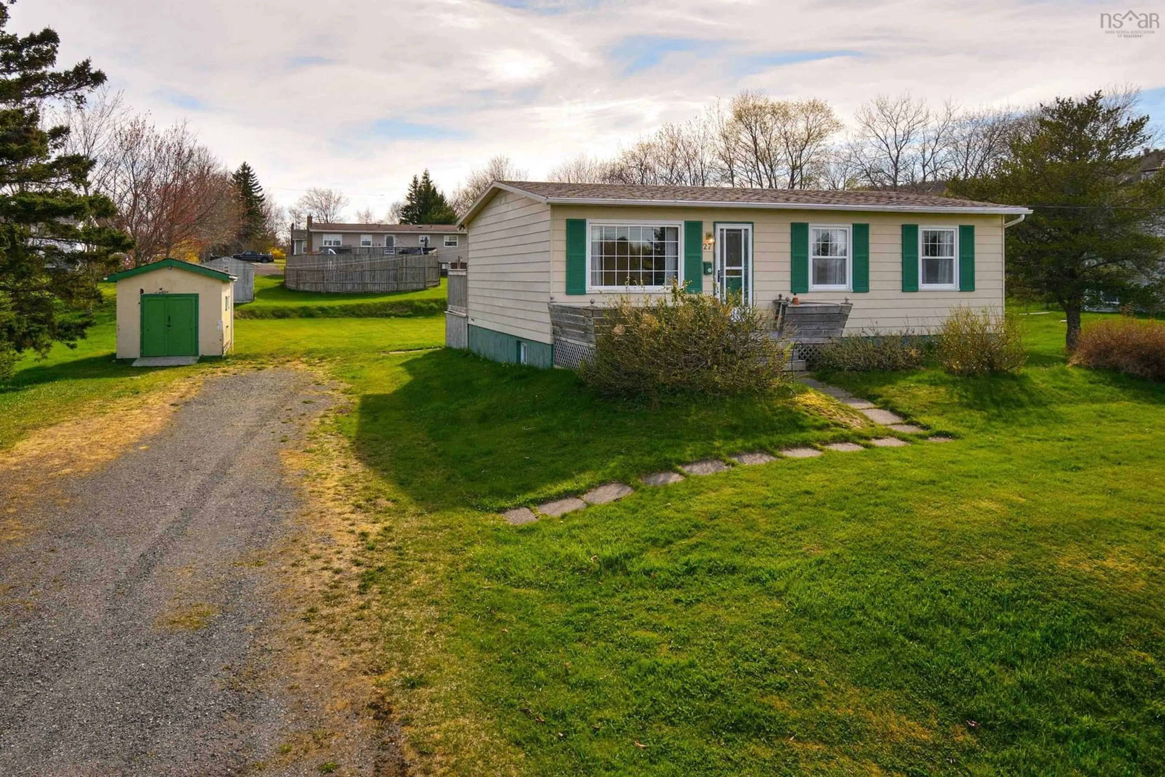 A pic from outside/outdoor area/front of a property/back of a property/a pic from drone, street for 27 Rennett St, Coxheath Nova Scotia B1L 1C8