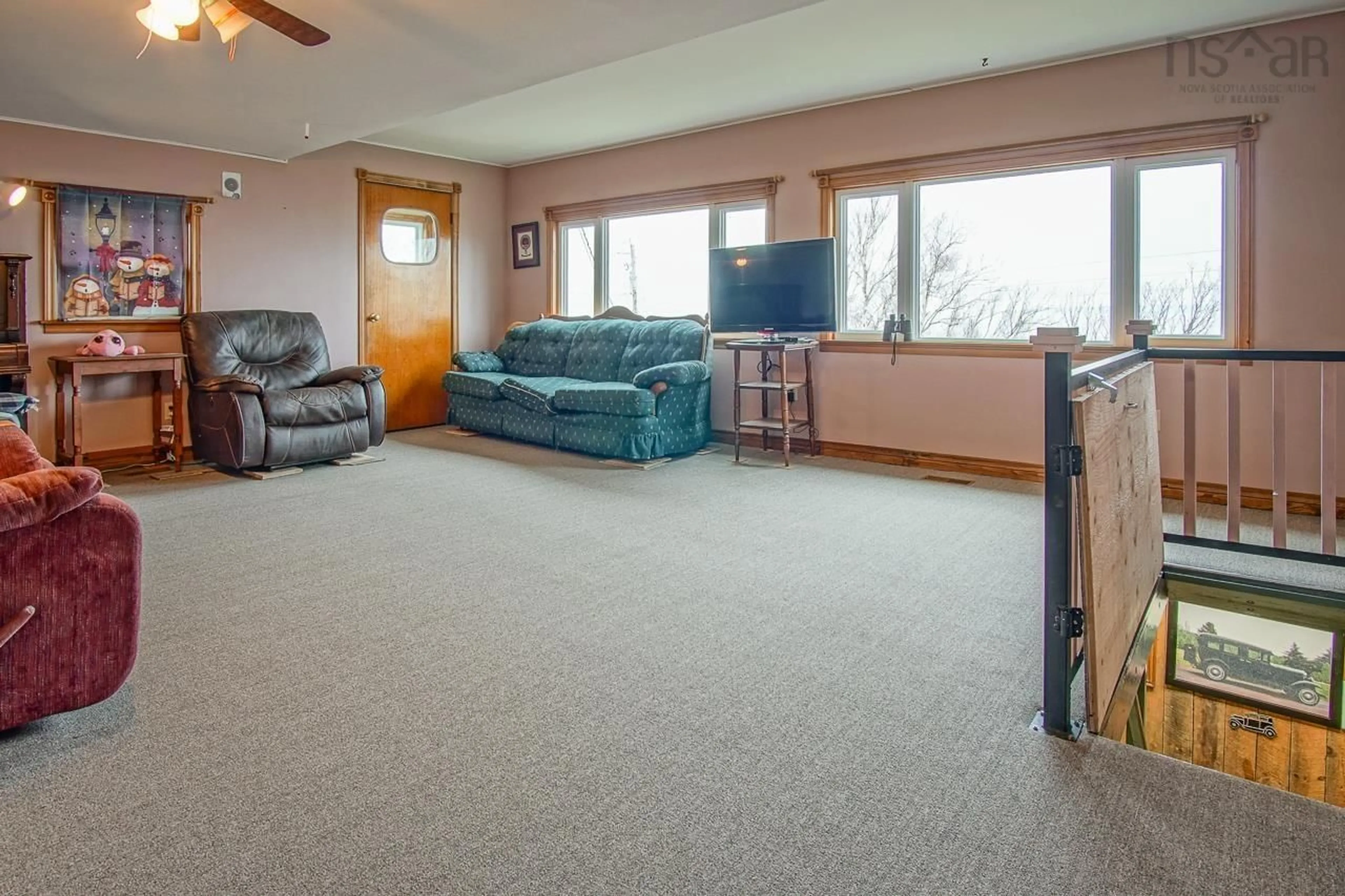 Living room with furniture, unknown for 22 Pent Rd, Harbourville Nova Scotia B0P 1E0