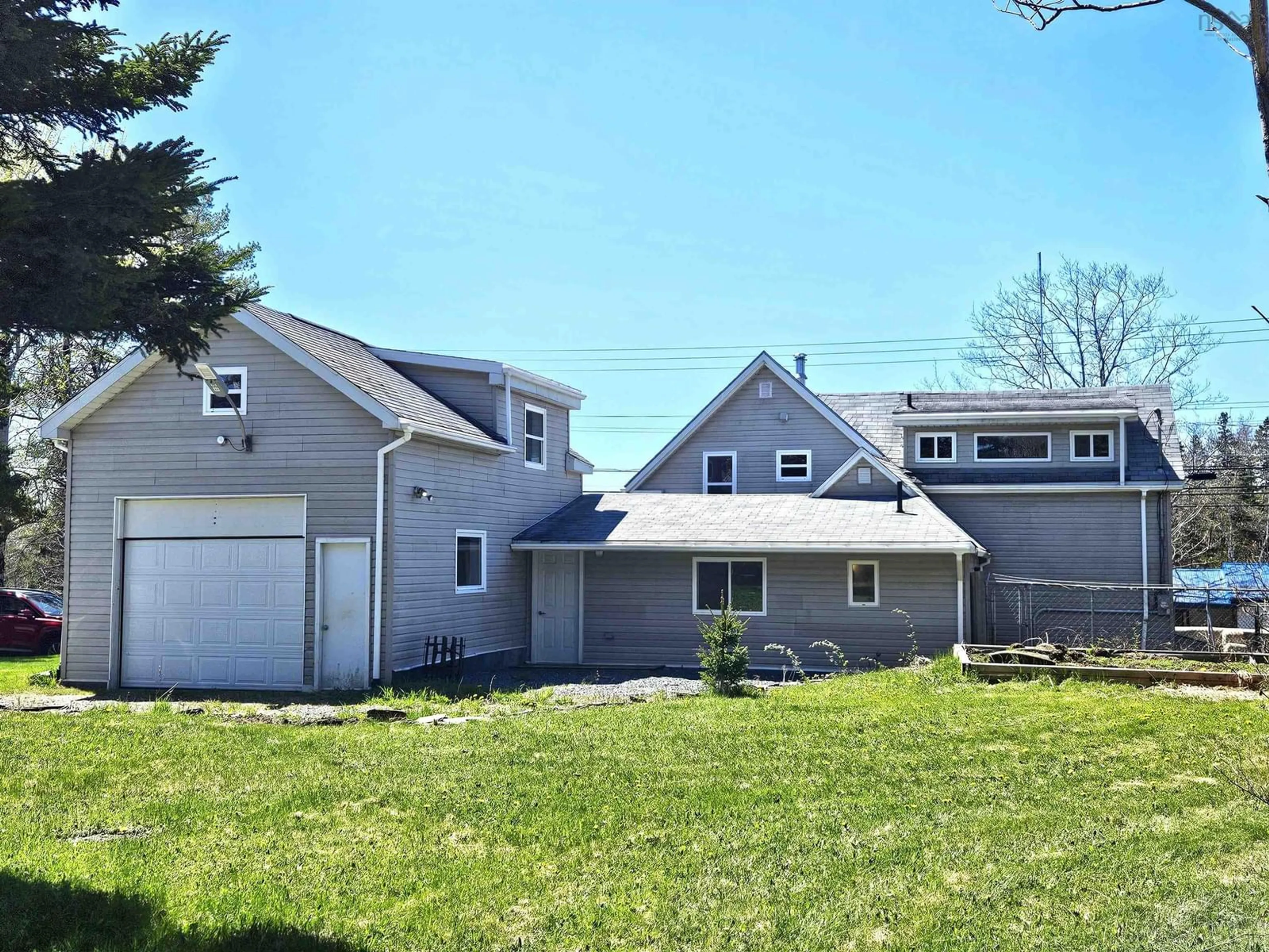 A pic from outside/outdoor area/front of a property/back of a property/a pic from drone, street for 8577 Highway 7, Musquodoboit Harbour Nova Scotia B0J 2L0