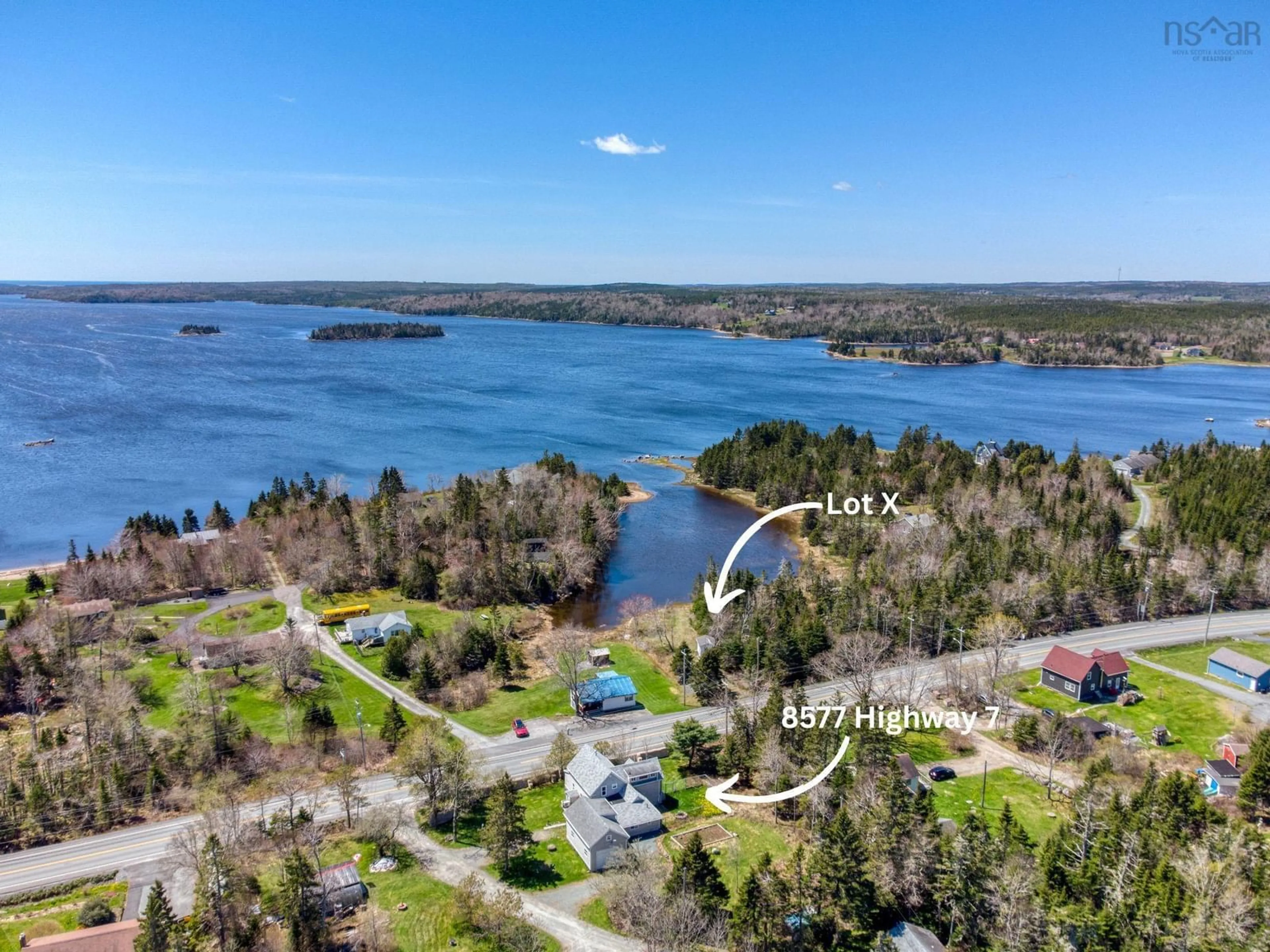 A pic from outside/outdoor area/front of a property/back of a property/a pic from drone, water/lake/river/ocean view for 8577 Highway 7, Musquodoboit Harbour Nova Scotia B0J 2L0