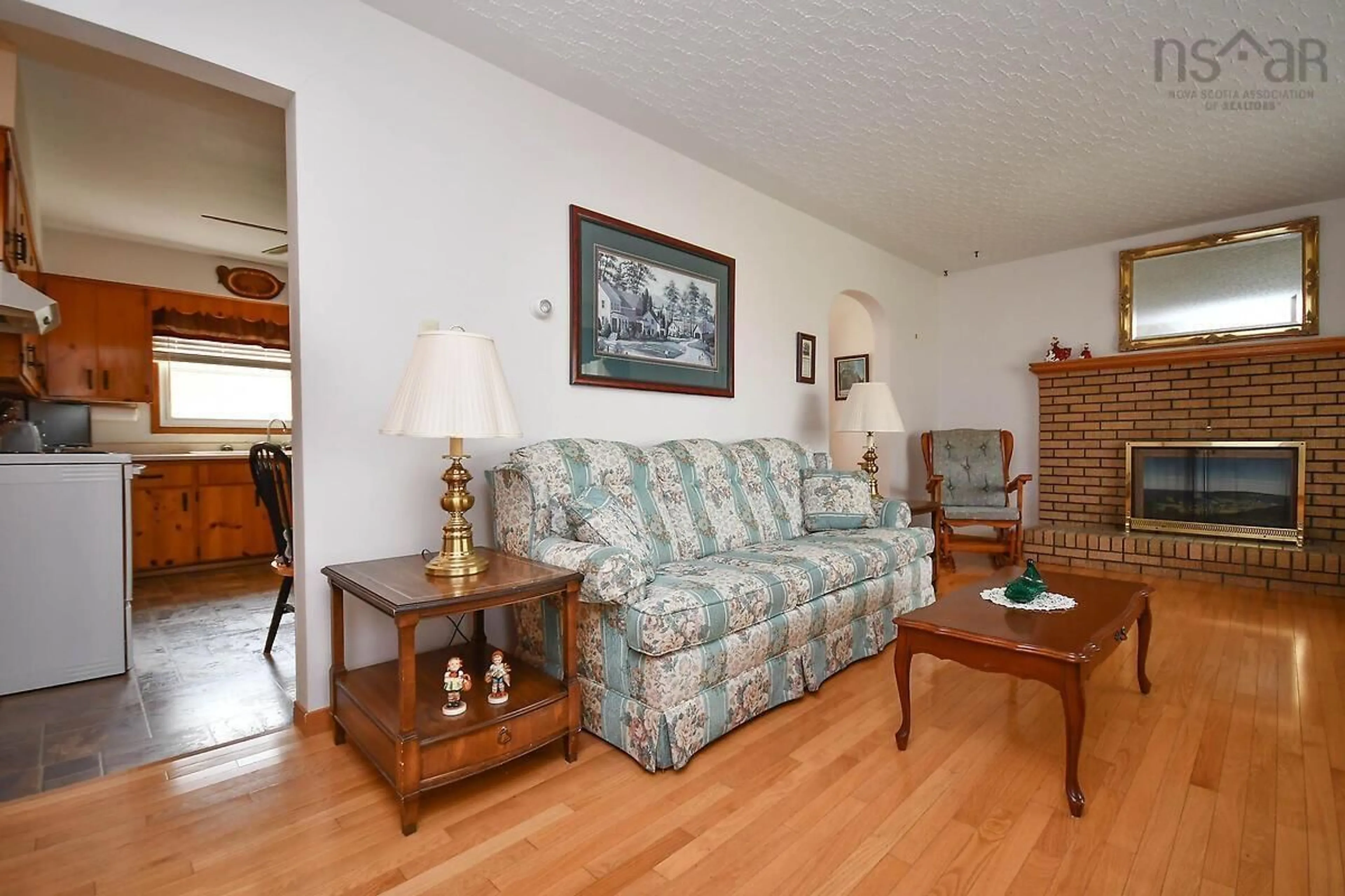 Living room with furniture, wood/laminate floor for 67 Evergreen Dr, Salmon River Nova Scotia B2N 5S7