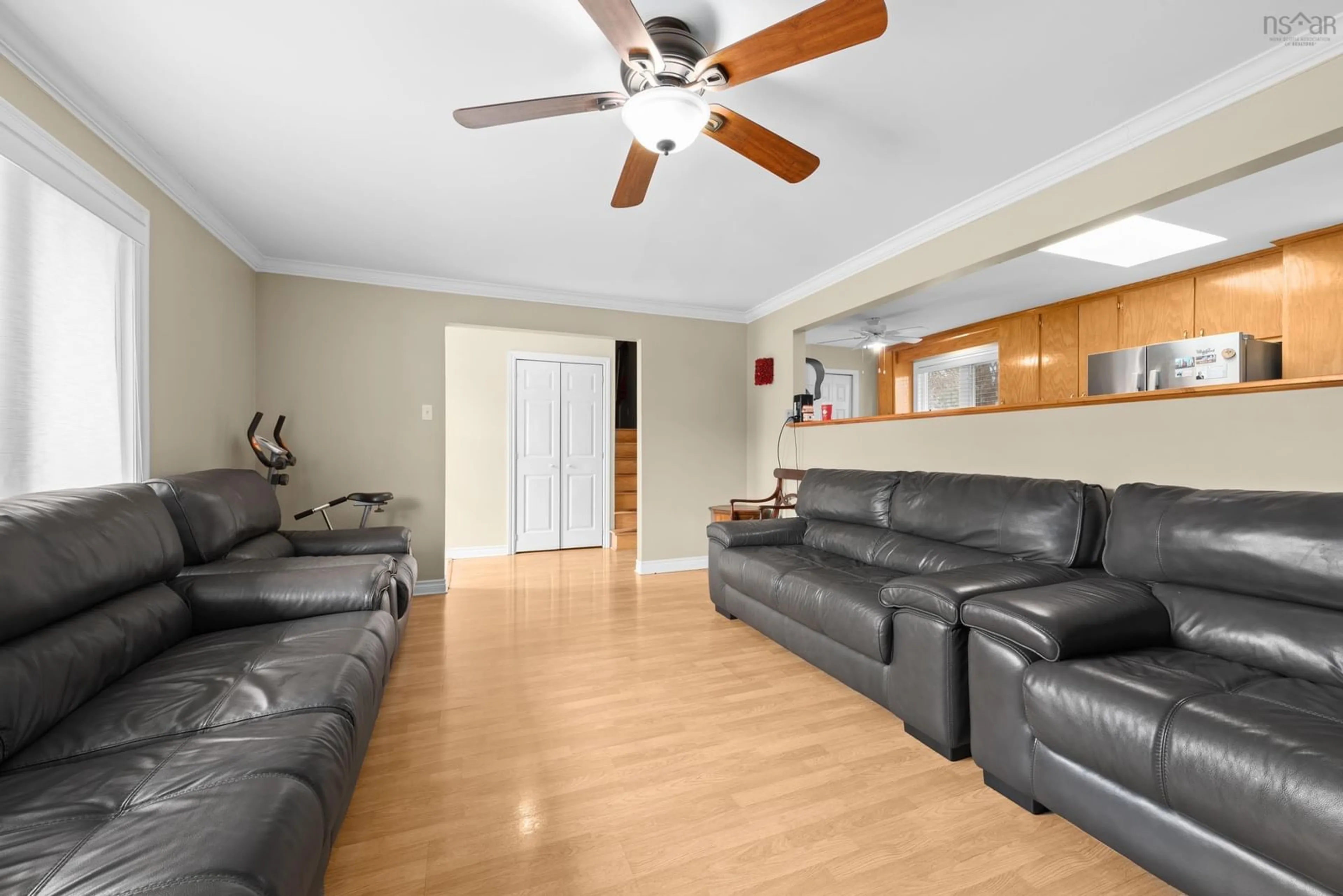 Living room with furniture, wood/laminate floor for 34 Steeves Crt, Sackville Nova Scotia B4C 1K5
