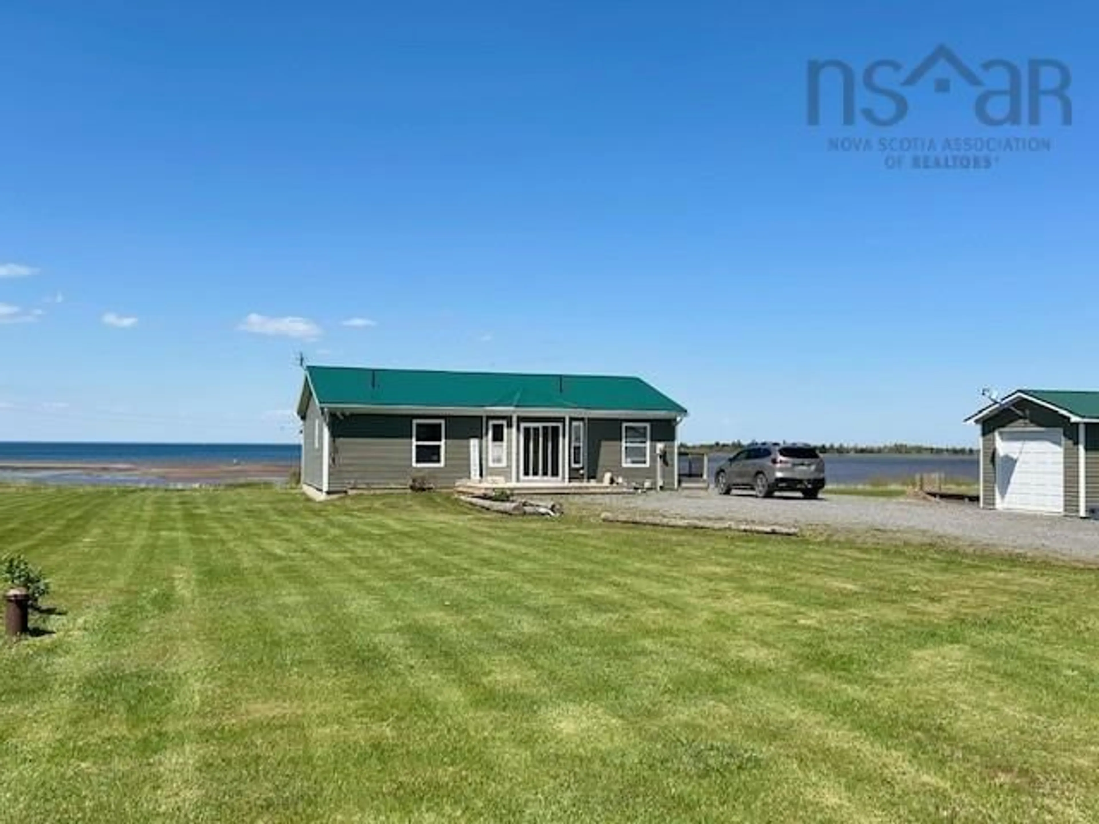 A pic from outside/outdoor area/front of a property/back of a property/a pic from drone, water/lake/river/ocean view for 1353 Blue Sea Rd, Malagash Point Nova Scotia B0K 1E0