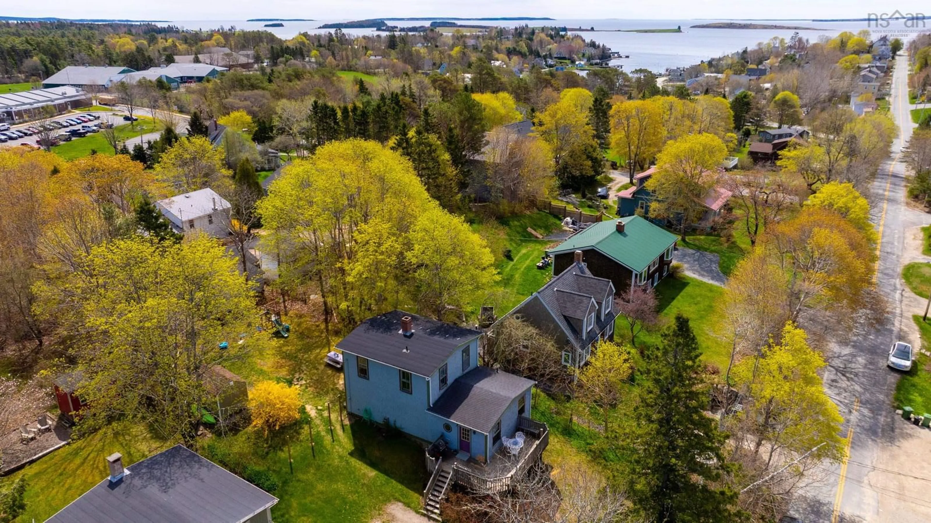 A pic from outside/outdoor area/front of a property/back of a property/a pic from drone, water/lake/river/ocean view for 198 Queen St, Chester Nova Scotia B0J 1J0