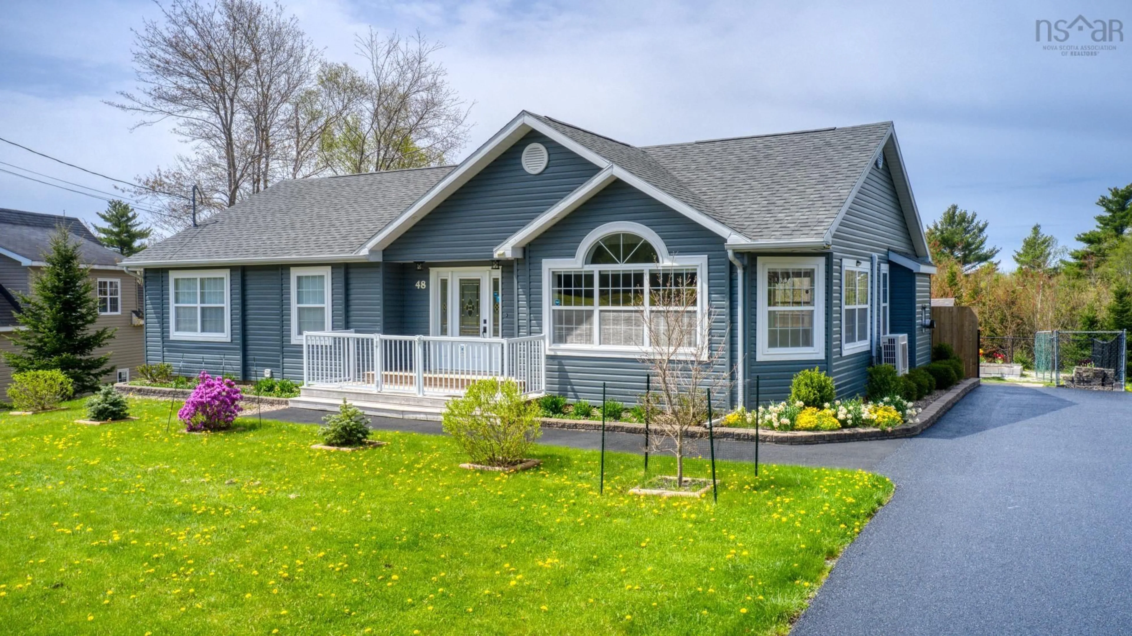 Home with vinyl exterior material, street for 48 Craig Chandler Dr, Pine Grove Nova Scotia B4V 7Z9