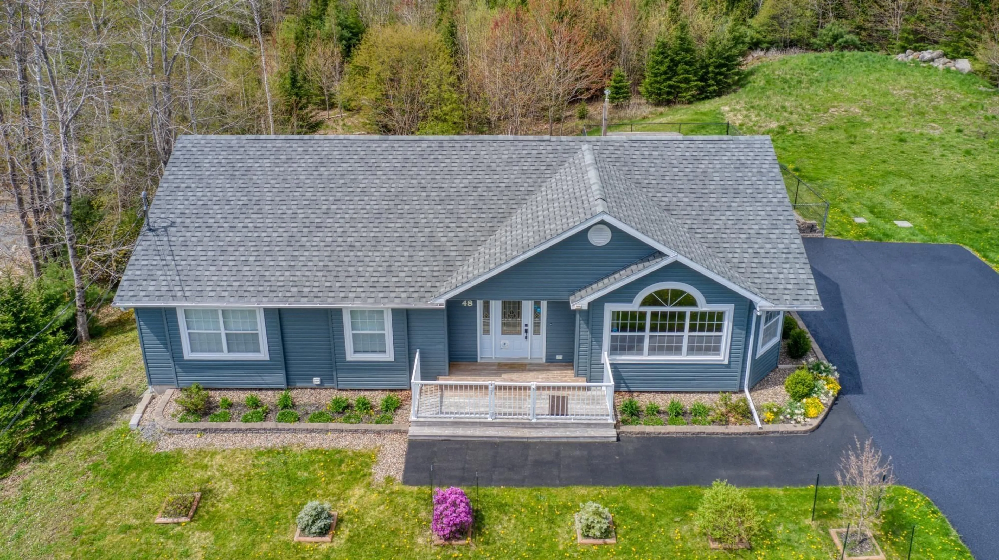 A pic from outside/outdoor area/front of a property/back of a property/a pic from drone, unknown for 48 Craig Chandler Dr, Pine Grove Nova Scotia B4V 7Z9