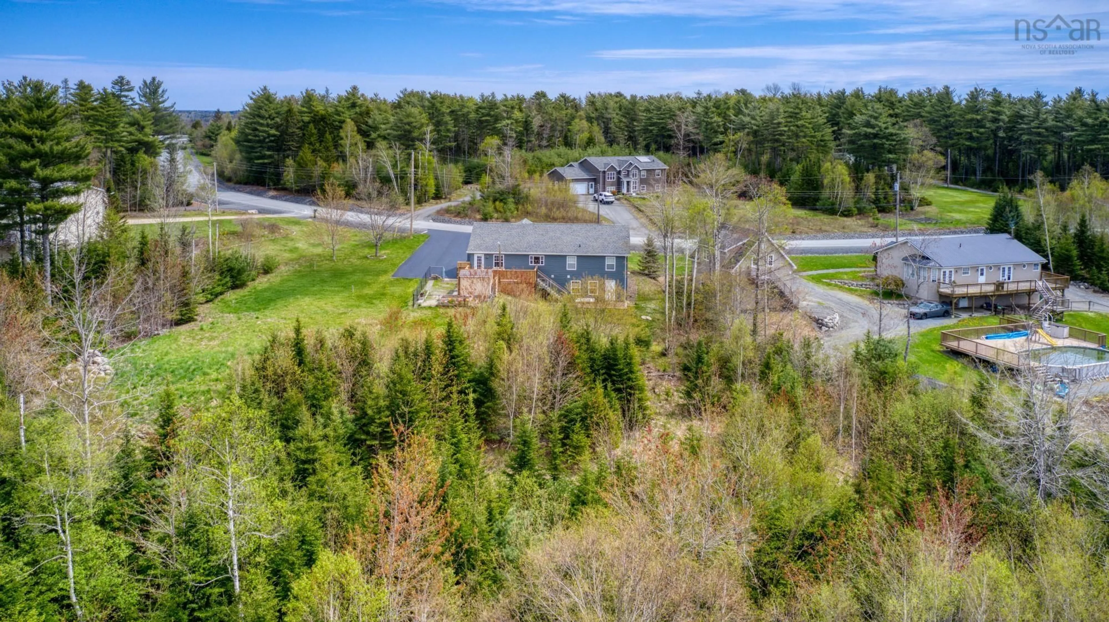 A pic from outside/outdoor area/front of a property/back of a property/a pic from drone, forest/trees view for 48 Craig Chandler Dr, Pine Grove Nova Scotia B4V 7Z9