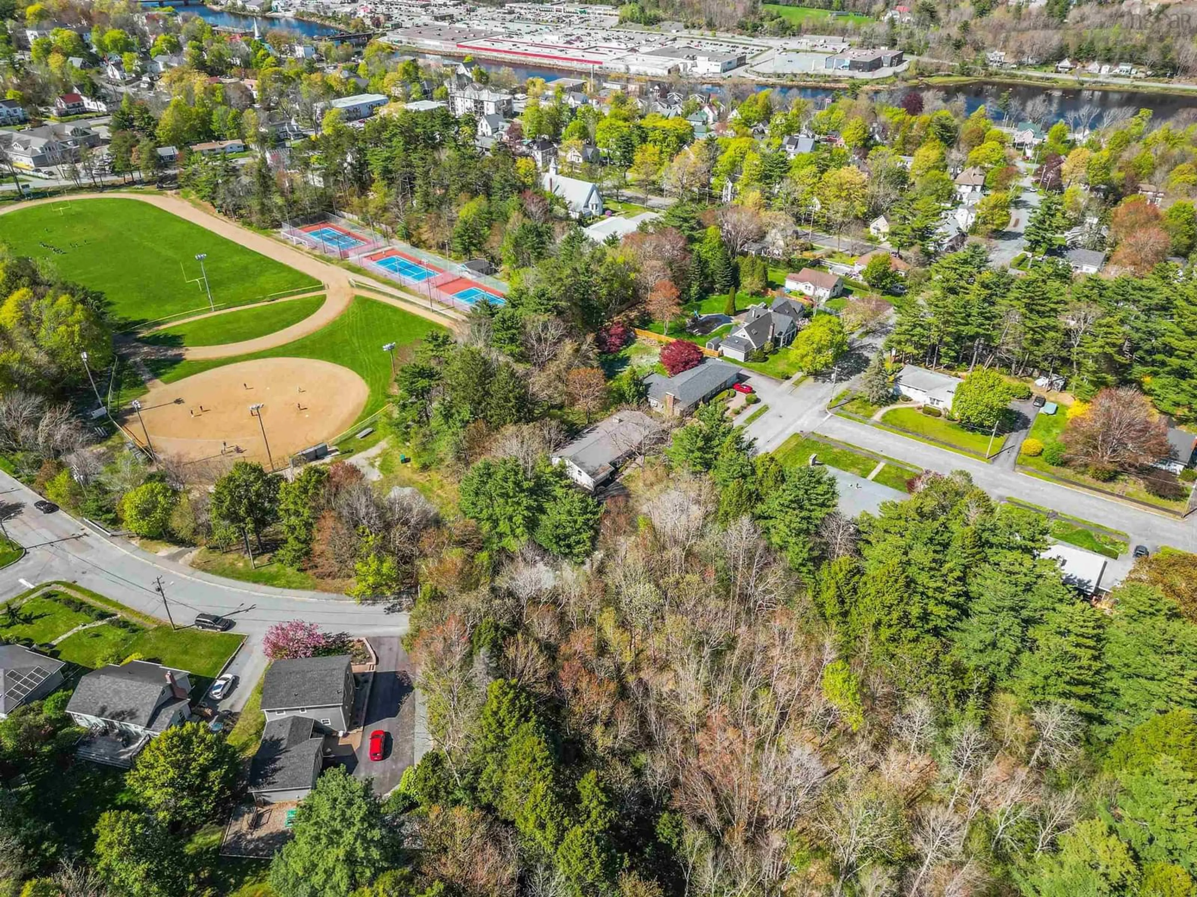 A pic from outside/outdoor area/front of a property/back of a property/a pic from drone, unknown for 108 Crescent St, Bridgewater Nova Scotia B4V 2C7