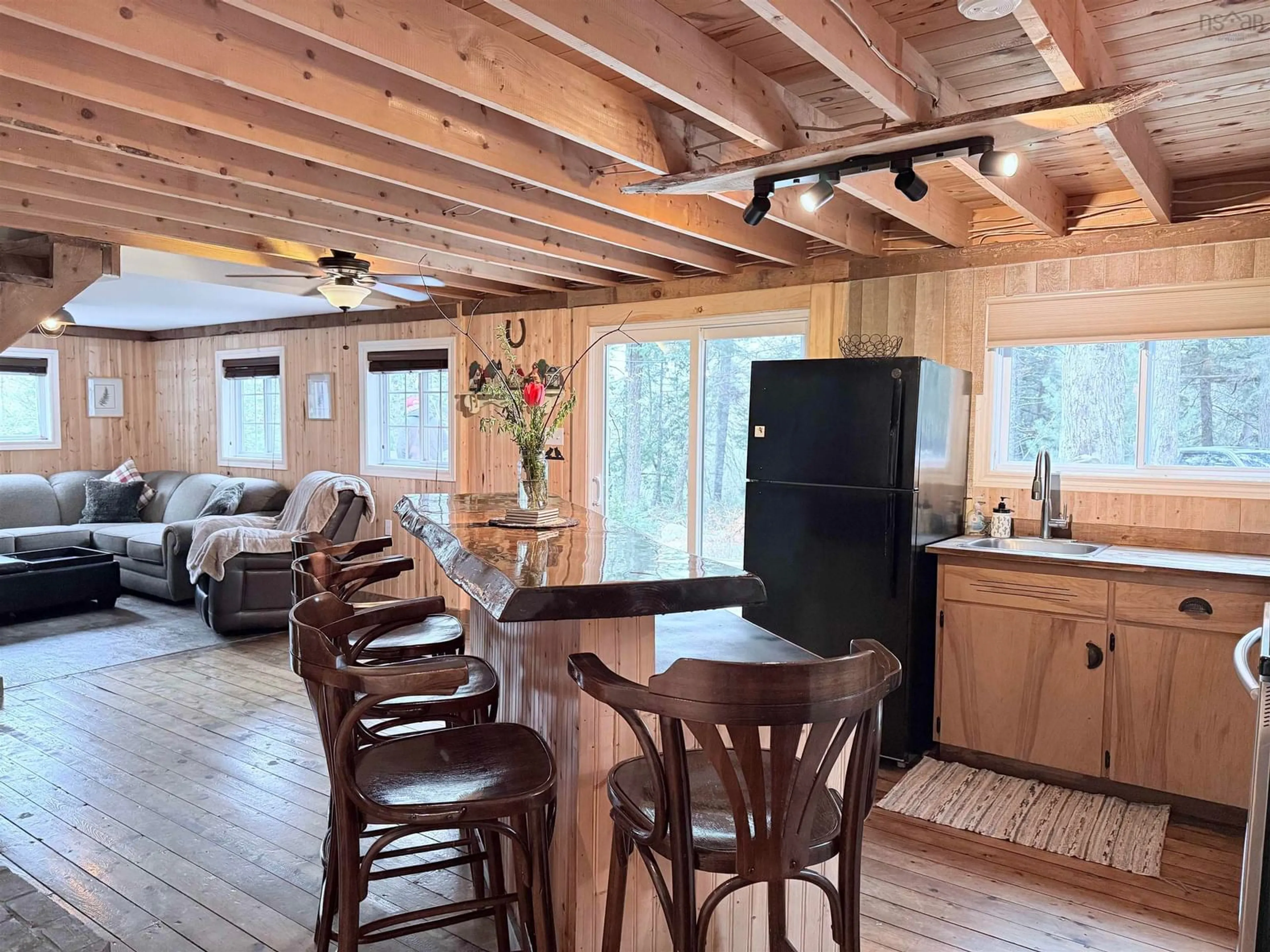 Open concept kitchen, wood/laminate floor for 737 Baker Point Rd, Molega North Nova Scotia B0T 1X0