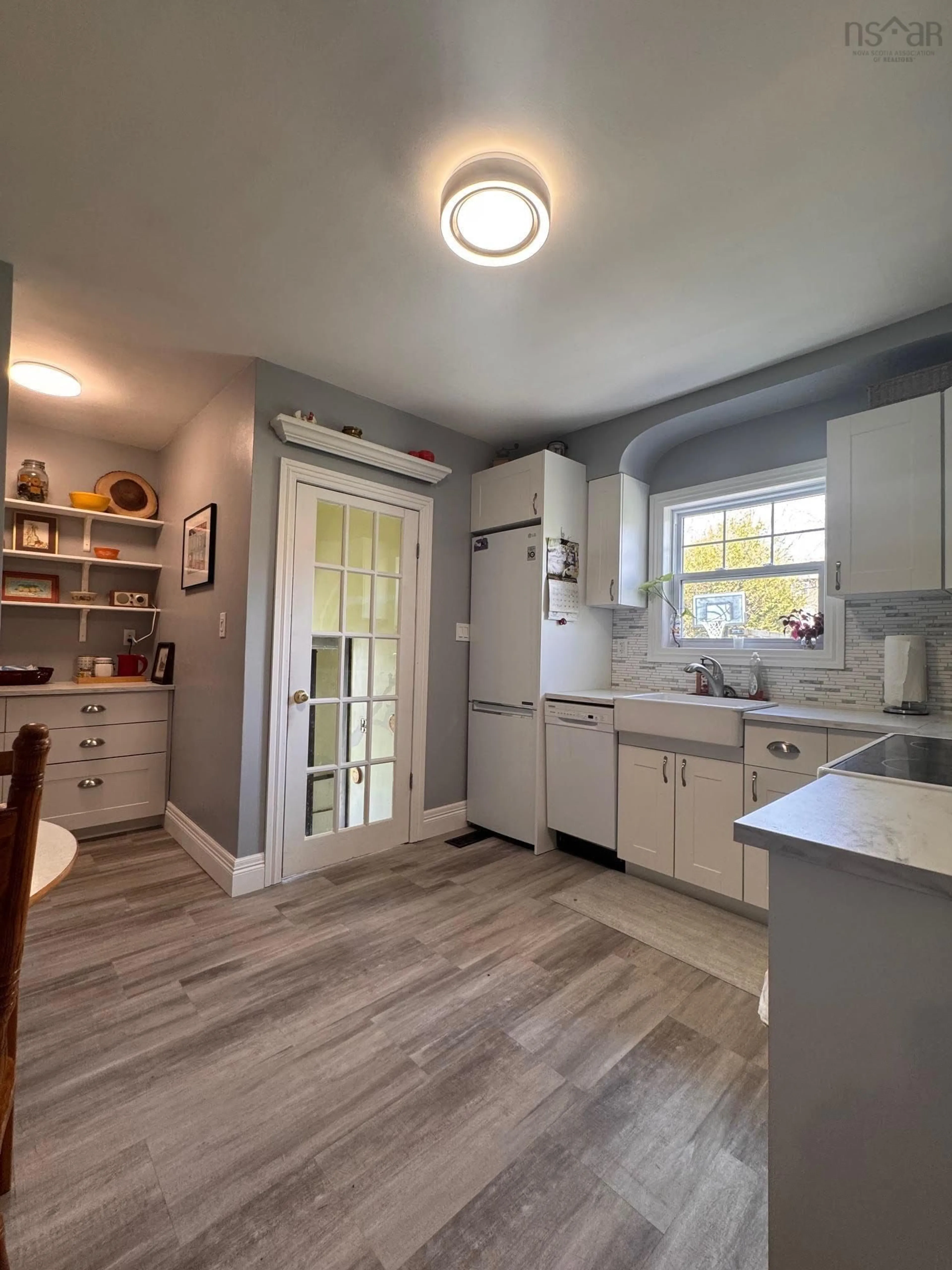 Open concept kitchen, ceramic/tile floor for 23 Mackenzie St, Dartmouth Nova Scotia B2W 1B1