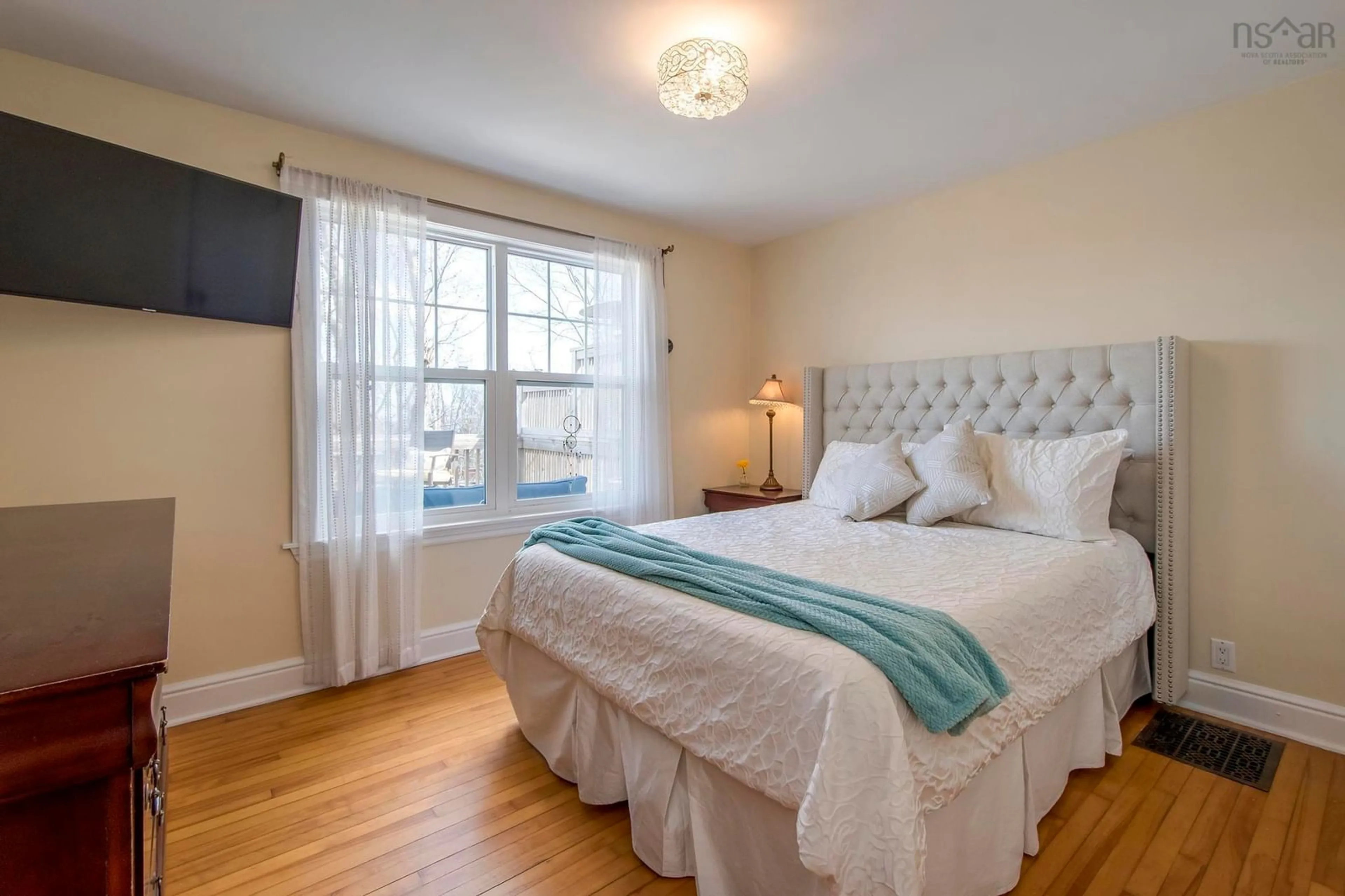 Bedroom with bed, wood/laminate floor for 240 High St, Bedford Nova Scotia B4A 1M6