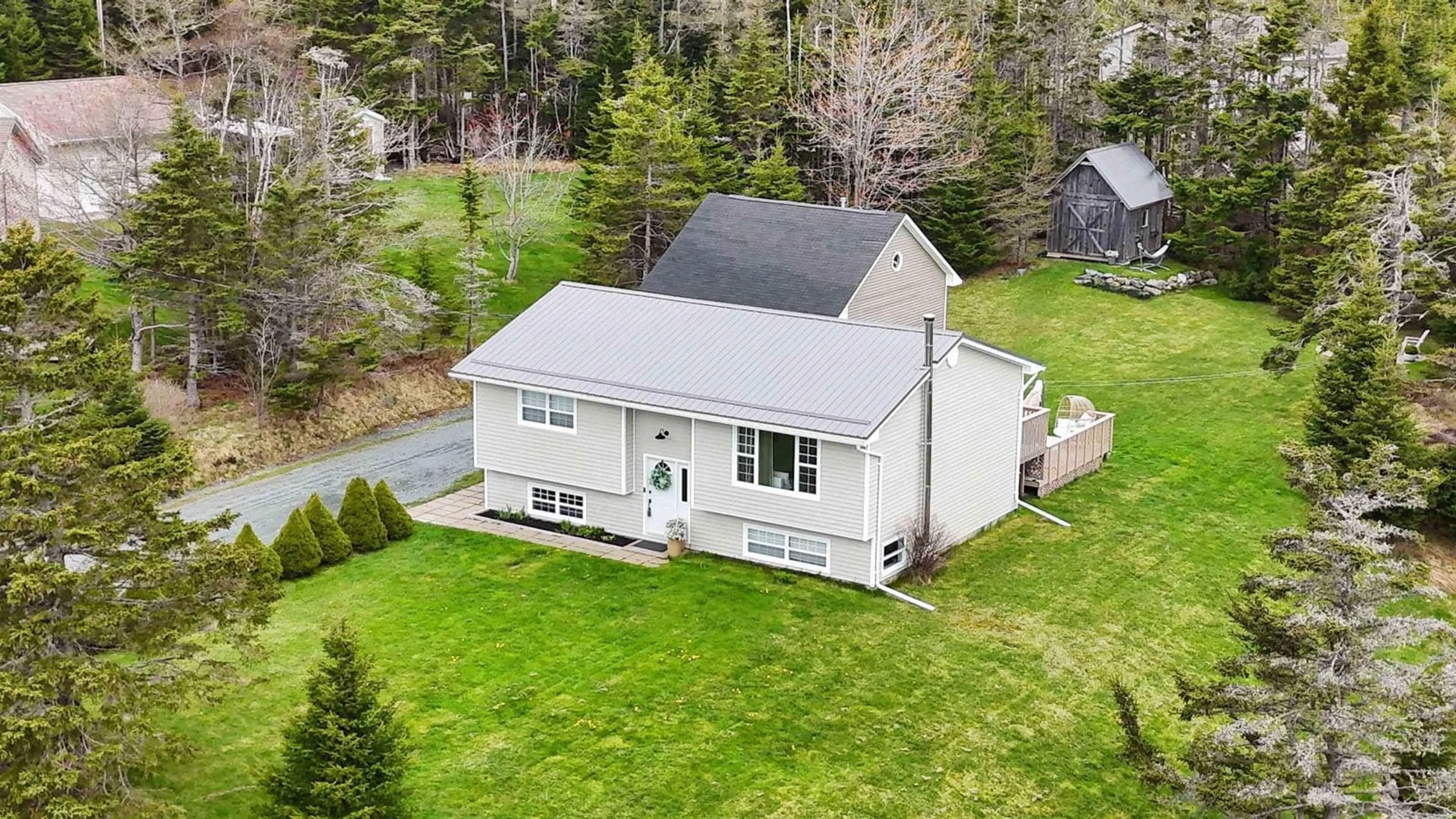 A pic from outside/outdoor area/front of a property/back of a property/a pic from drone, unknown for 59 Parkwood Dr, East Lawrencetown Nova Scotia B2Z 1P2