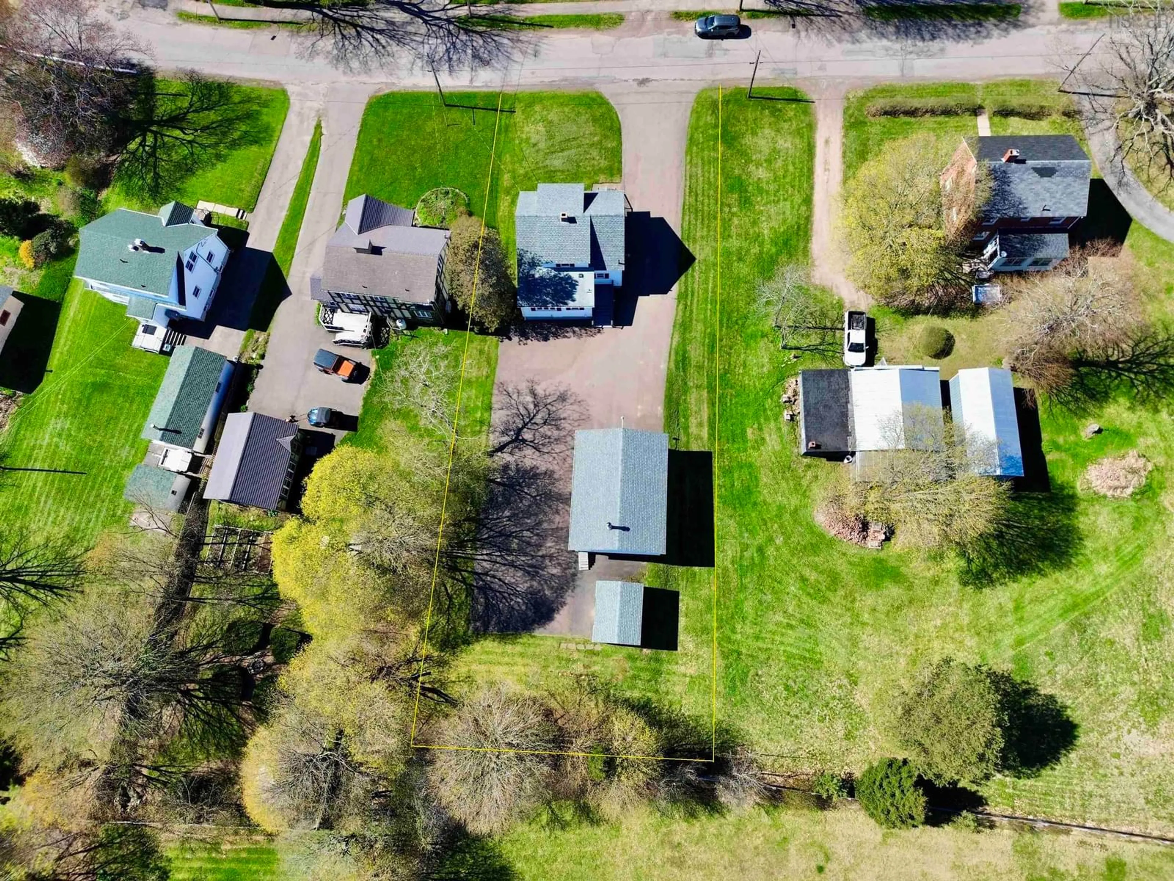 A pic from outside/outdoor area/front of a property/back of a property/a pic from drone, street for 5 Queen St, Amherst Nova Scotia B4H 1P7