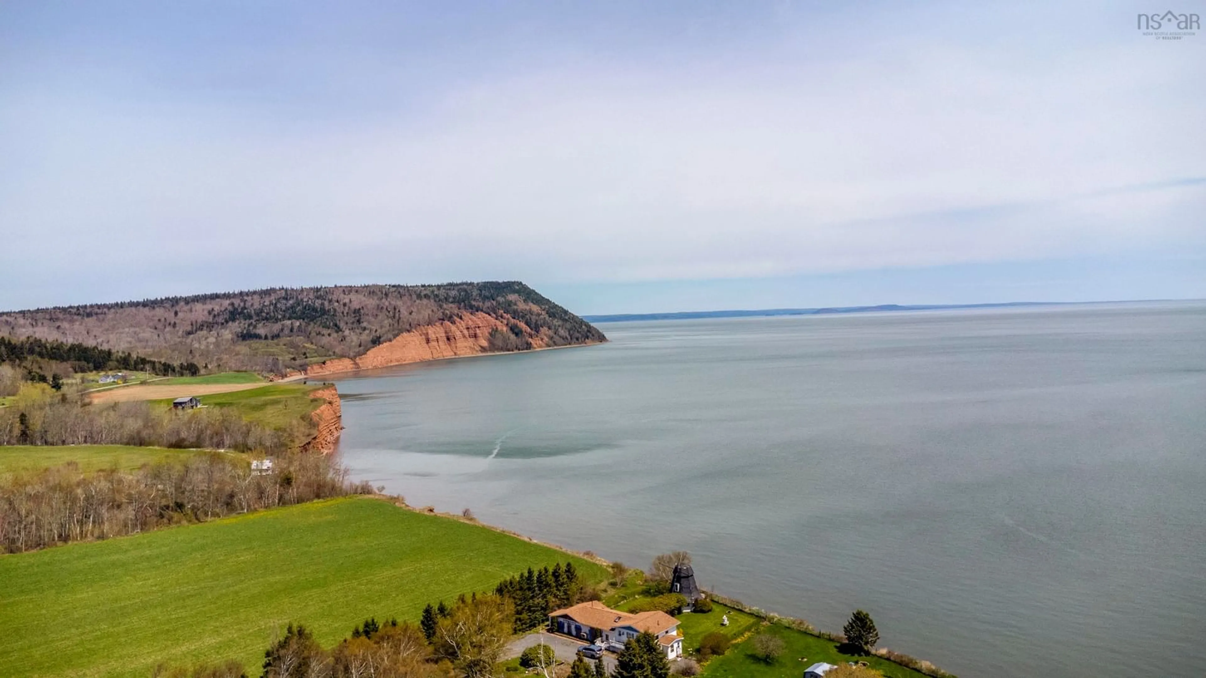 A pic from outside/outdoor area/front of a property/back of a property/a pic from drone, water/lake/river/ocean view for 70 Blomidon Cres, Lower Blomidon Nova Scotia B0P 1H0