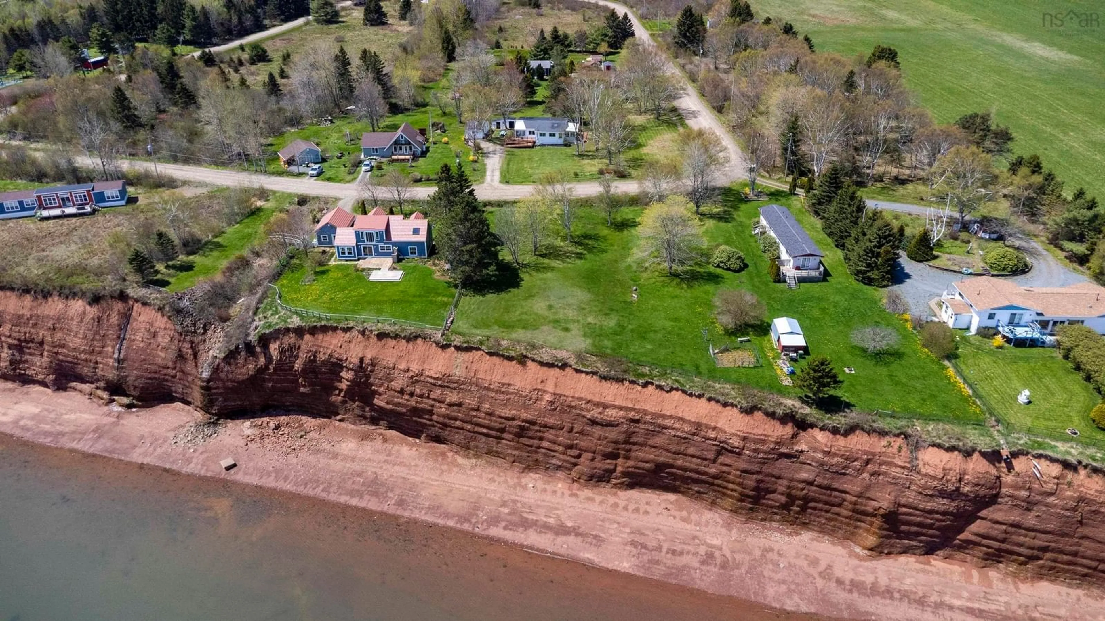 A pic from outside/outdoor area/front of a property/back of a property/a pic from drone, water/lake/river/ocean view for 70 Blomidon Cres, Lower Blomidon Nova Scotia B0P 1H0