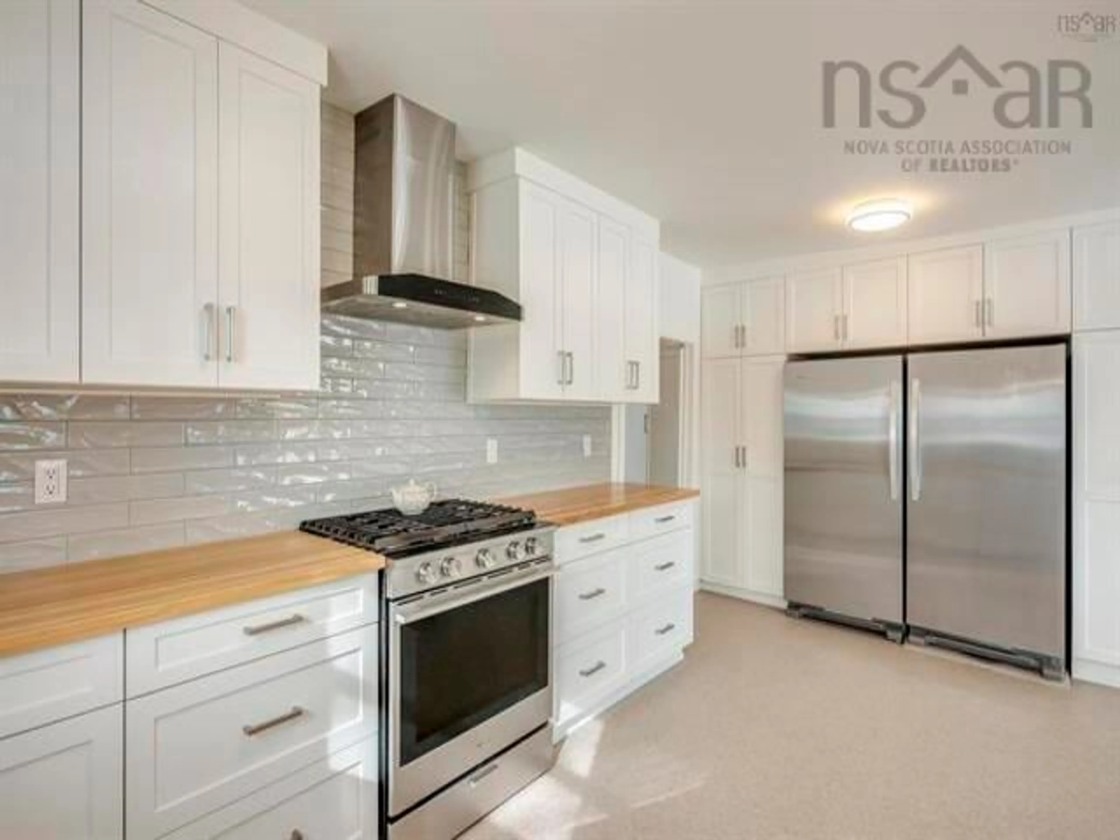 Open concept kitchen, ceramic/tile floor for 70 Blomidon Cres, Lower Blomidon Nova Scotia B0P 1H0