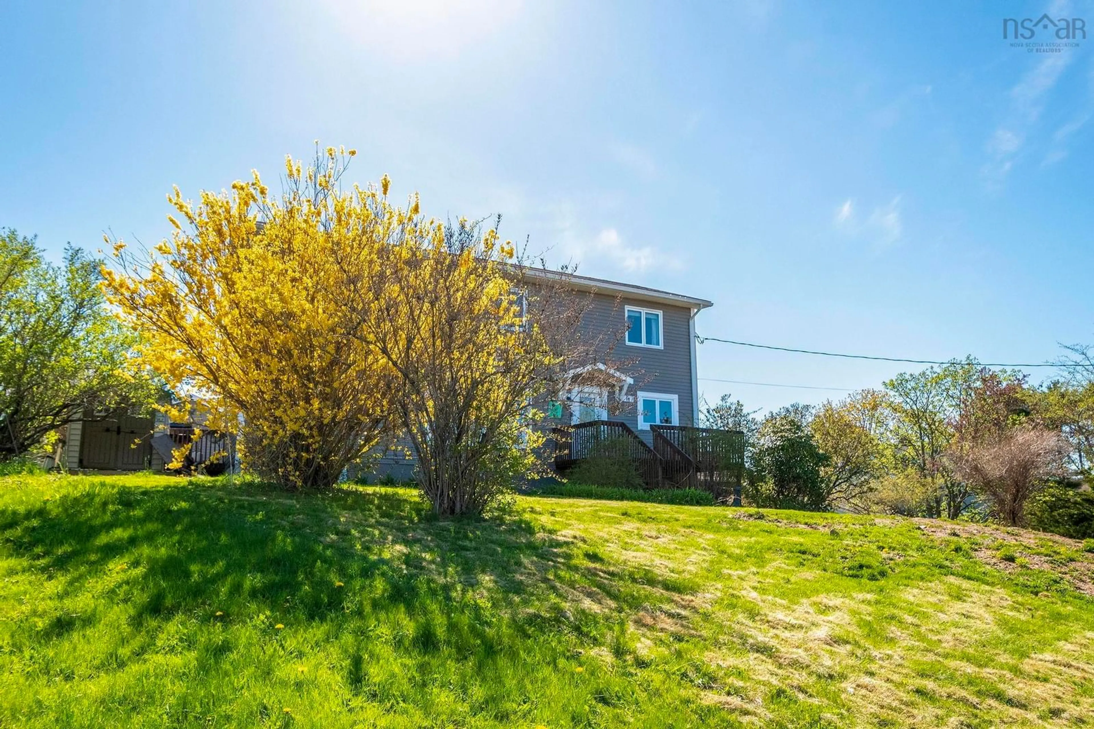 A pic from outside/outdoor area/front of a property/back of a property/a pic from drone, water/lake/river/ocean view for 10 Bridgeview Ave, Lower Sackville Nova Scotia B4C 2K6