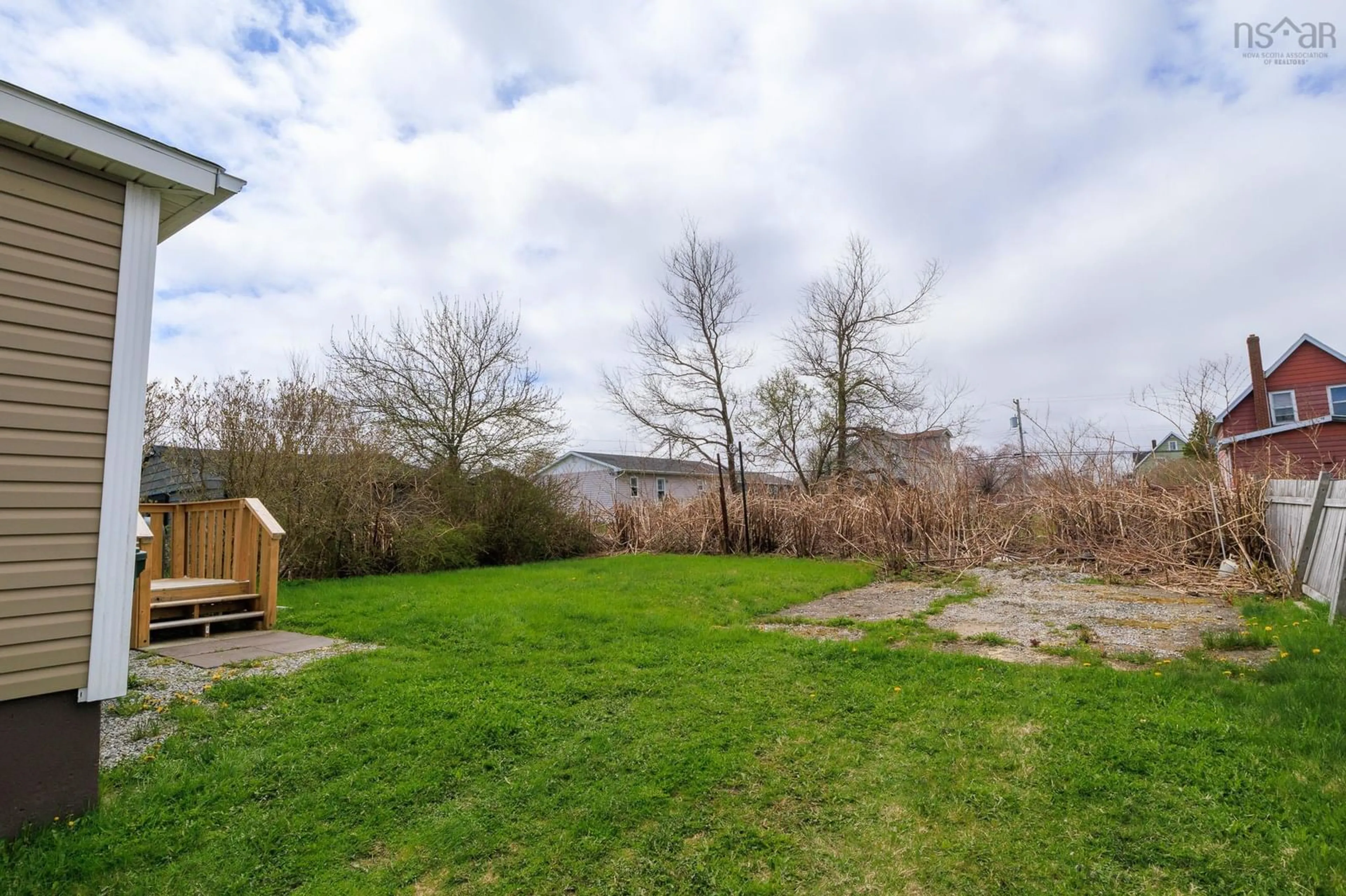 A pic from outside/outdoor area/front of a property/back of a property/a pic from drone, water/lake/river/ocean view for 16 Dragatis Street, Glace Bay Nova Scotia B1A 2B5