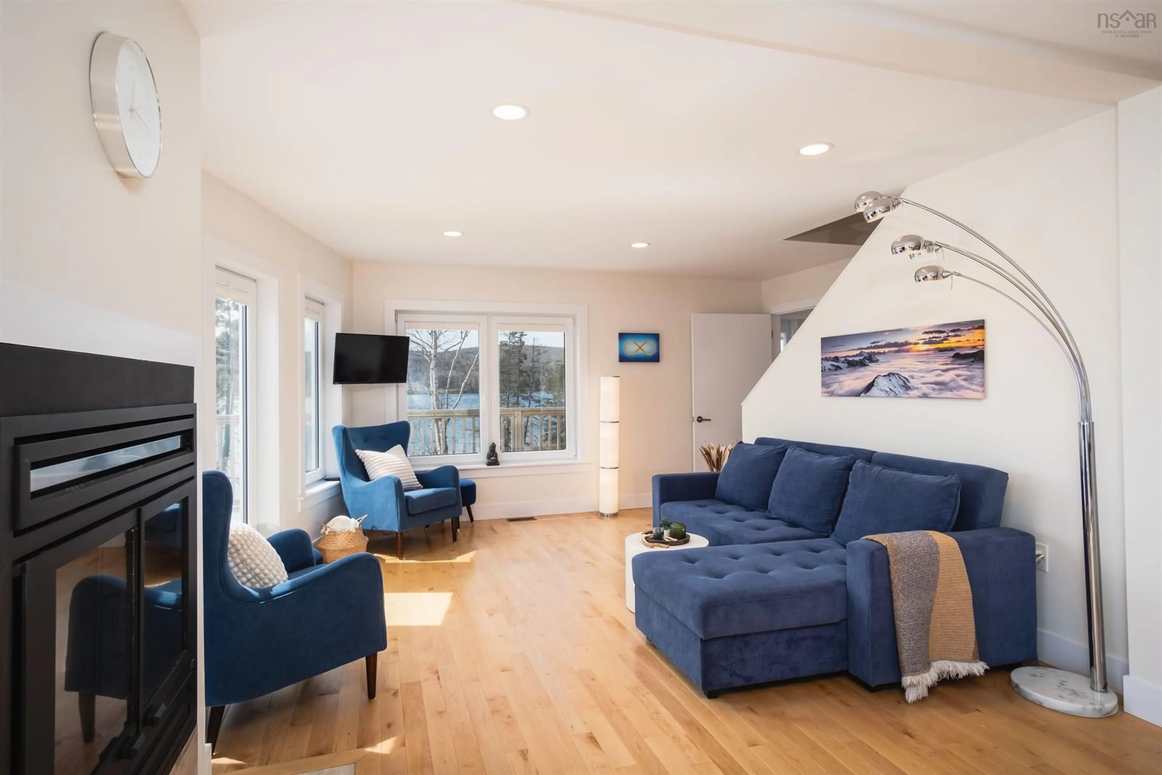 Living room with furniture, wood/laminate floor for 234 Redbird Dr, Malagawatch Nova Scotia B0E 2Y0
