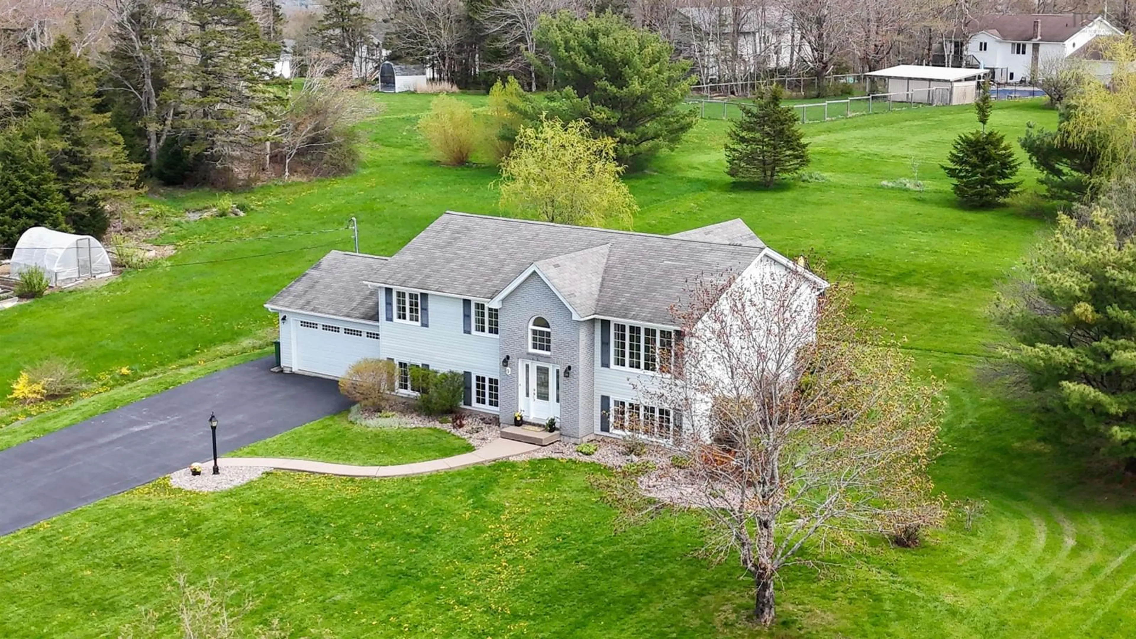 A pic from outside/outdoor area/front of a property/back of a property/a pic from drone, street for 9 Vrege Crt, Hammonds Plains Nova Scotia B4B 1K2