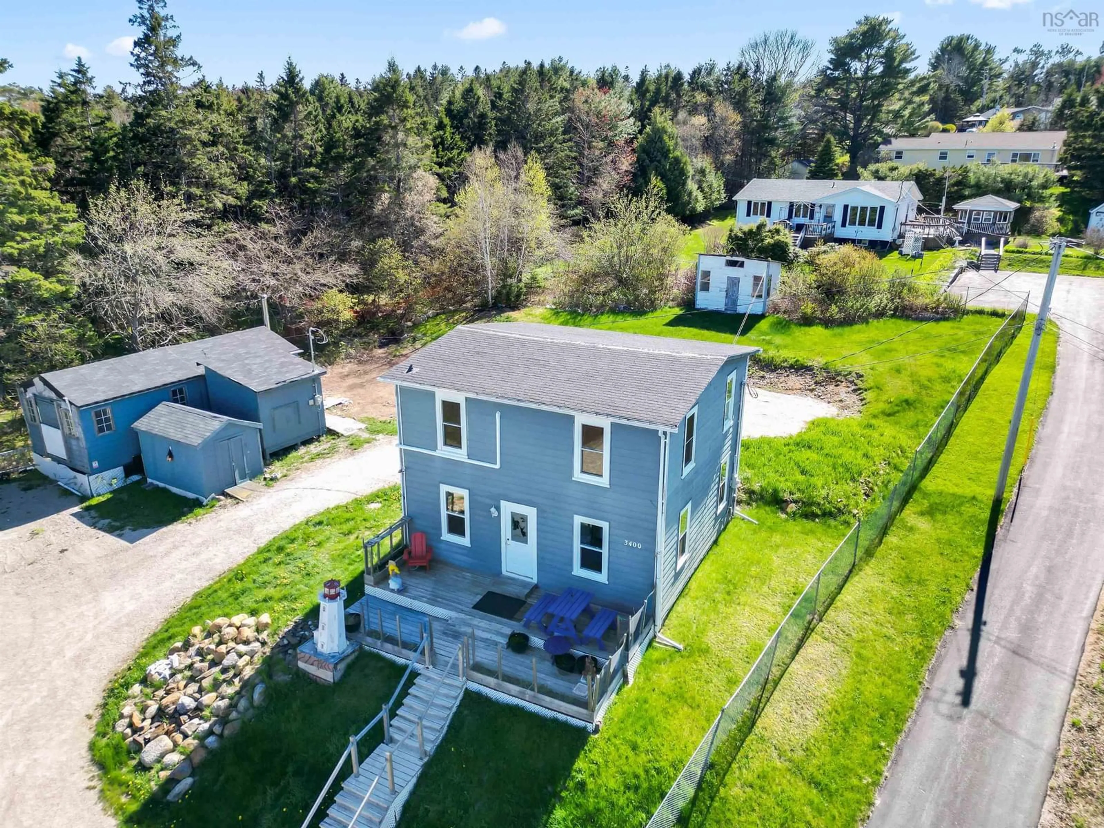 A pic from outside/outdoor area/front of a property/back of a property/a pic from drone, water/lake/river/ocean view for 3400 Highway 3, East Chester Nova Scotia B0J 1J0