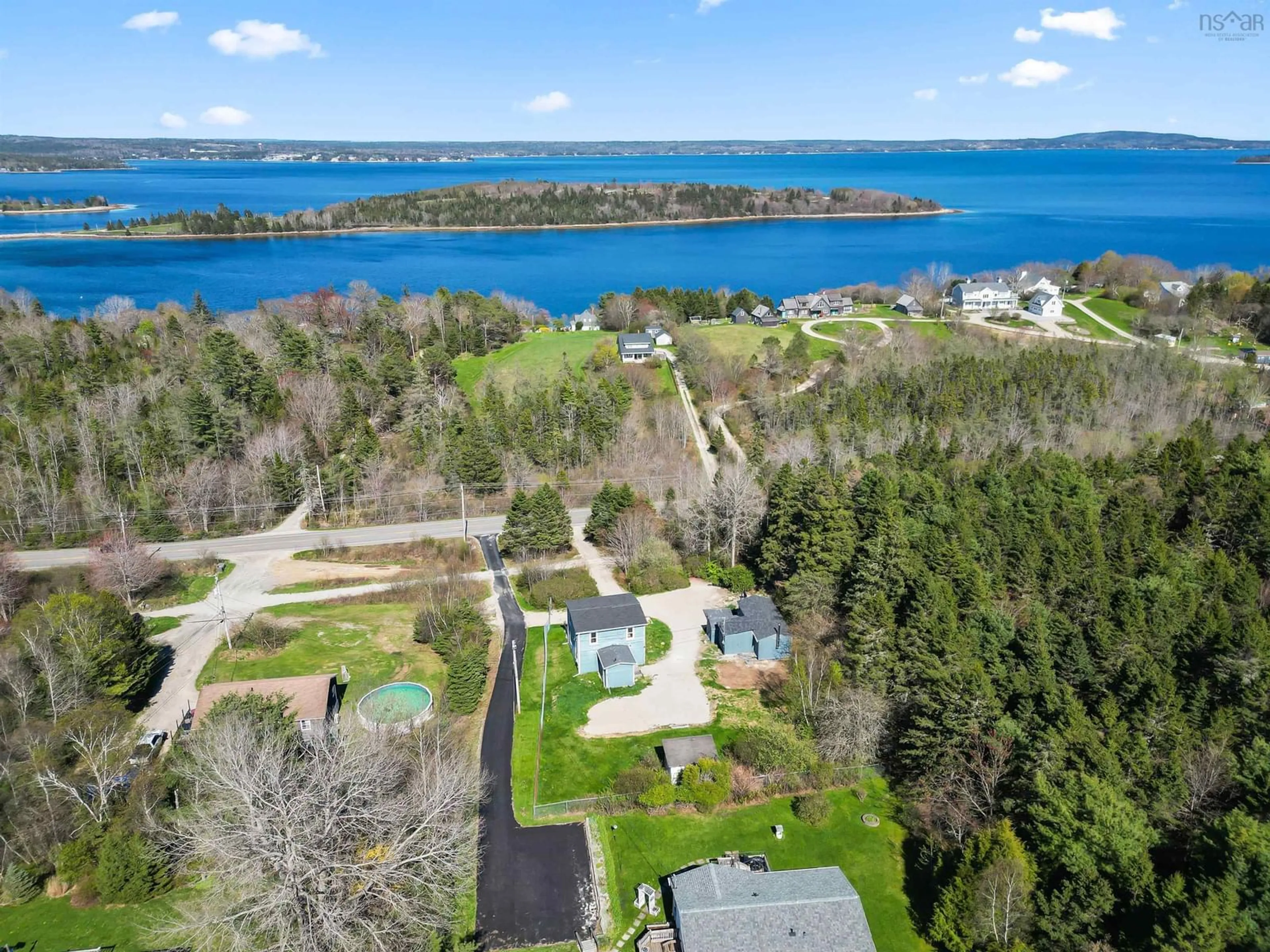 A pic from outside/outdoor area/front of a property/back of a property/a pic from drone, water/lake/river/ocean view for 3400 Highway 3, East Chester Nova Scotia B0J 1J0