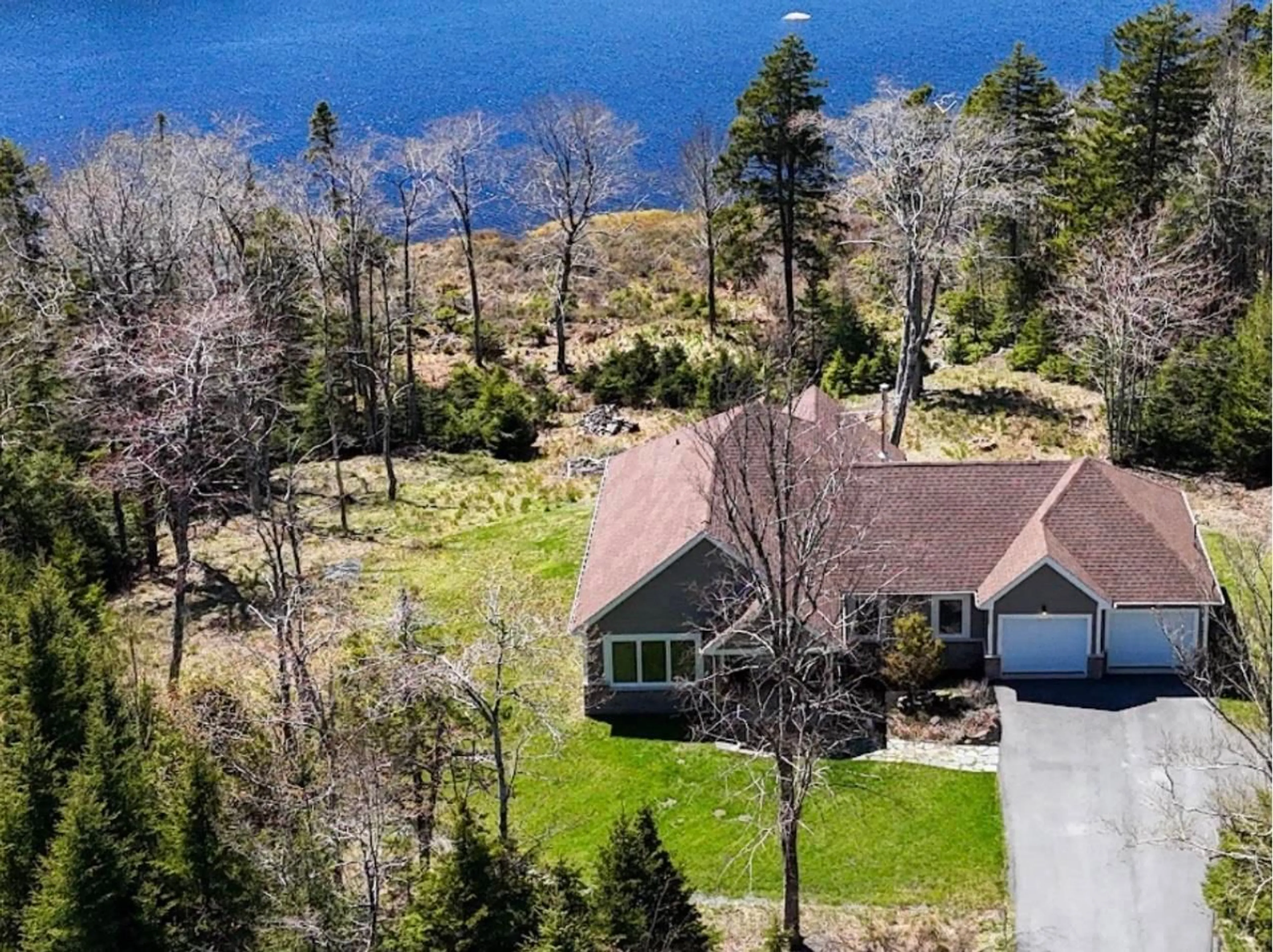A pic from outside/outdoor area/front of a property/back of a property/a pic from drone, water/lake/river/ocean view for 79 Yearling Close, Hammonds Plains Nova Scotia B4B 0N7