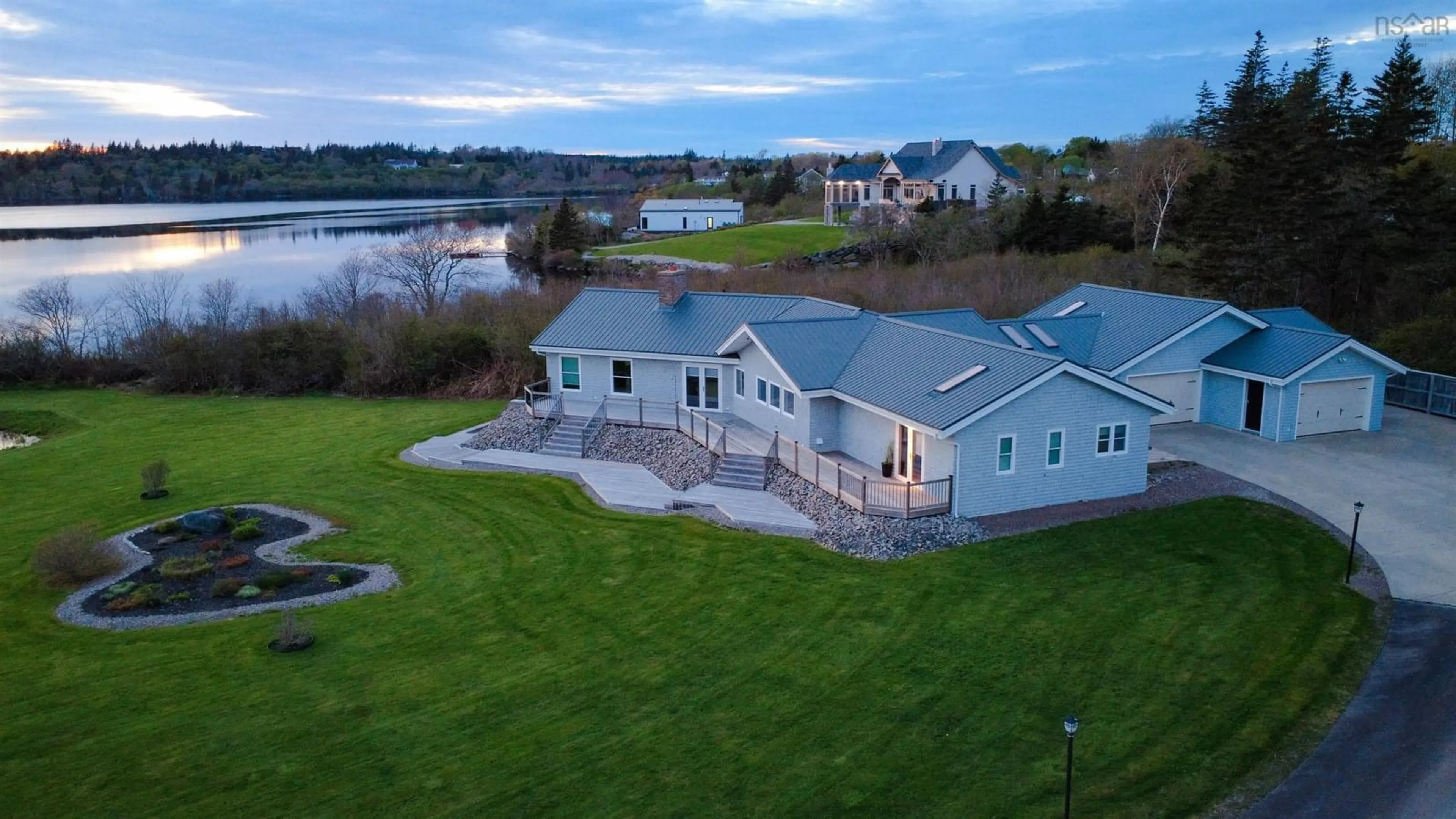 A pic from outside/outdoor area/front of a property/back of a property/a pic from drone, water/lake/river/ocean view for 52 Captain Landers Crt, Hebron Nova Scotia B5A 5Z6