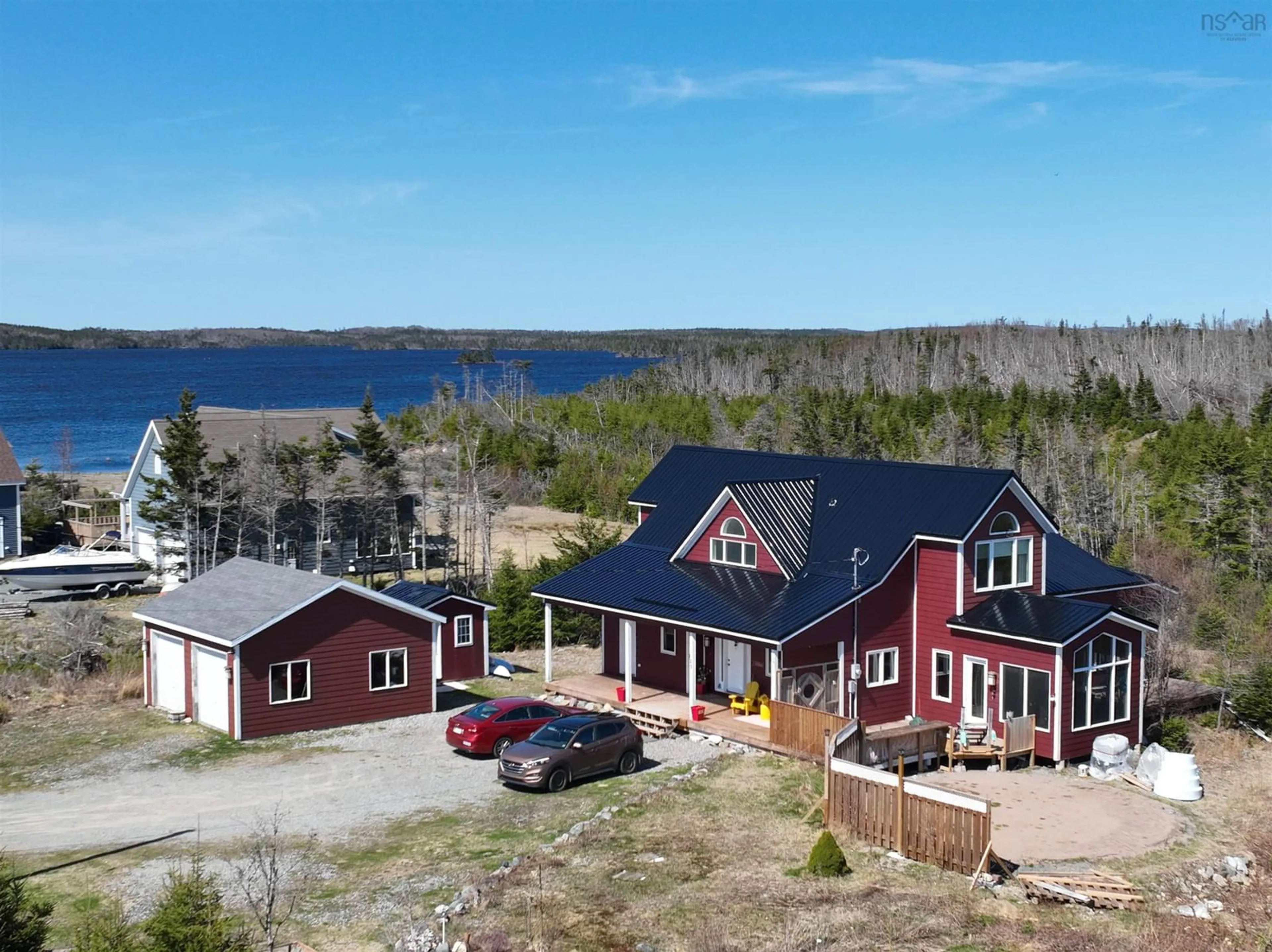 A pic from outside/outdoor area/front of a property/back of a property/a pic from drone, water/lake/river/ocean view for 125 Bastion Ave, Louisbourg Nova Scotia B1C 0A1