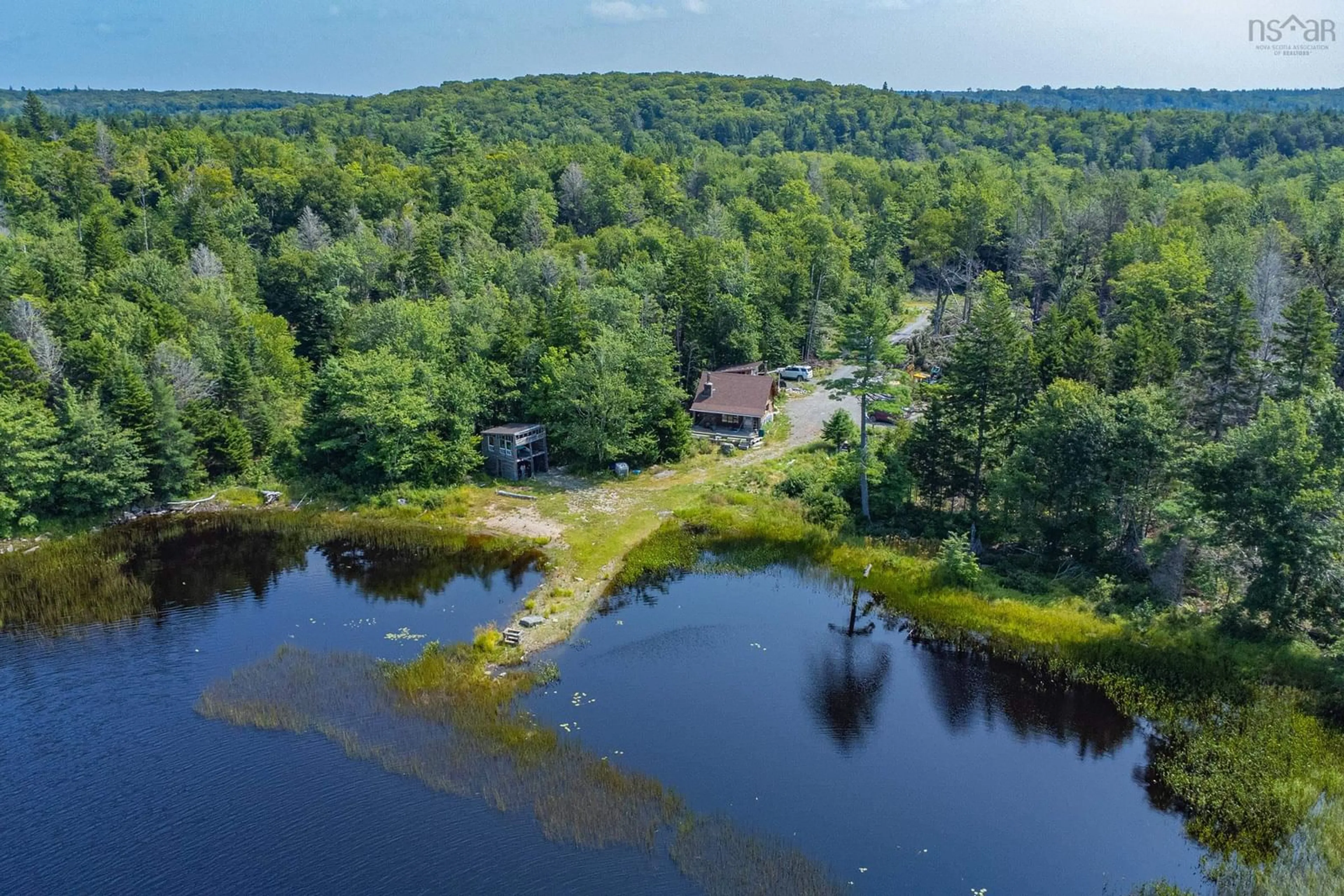 A pic from outside/outdoor area/front of a property/back of a property/a pic from drone, water/lake/river/ocean view for 49 Chemin Des Petites Cabanes Rd, Concession Nova Scotia B0W 1M0