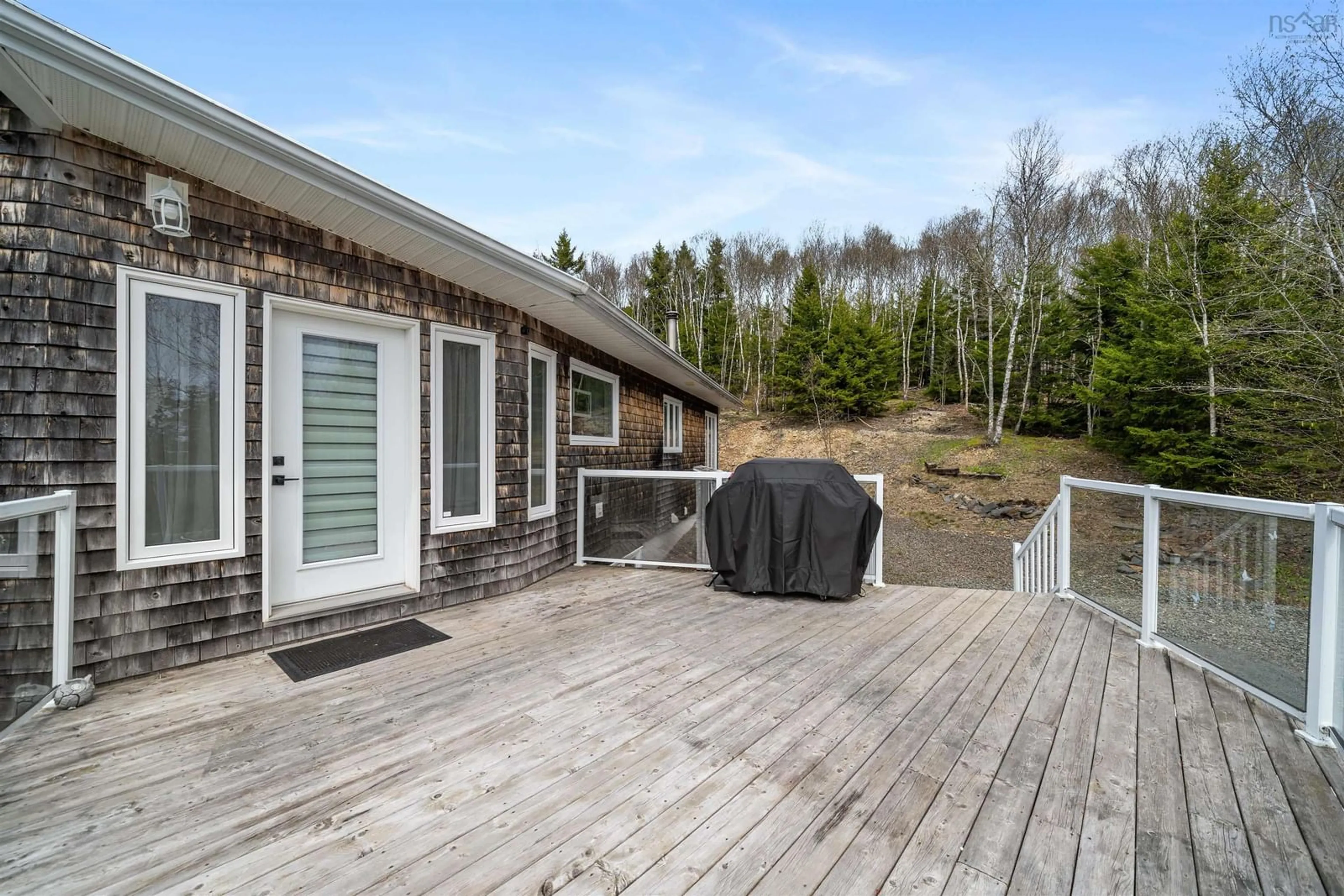Patio, forest/trees view for 59 Spring Tide Lane, Two Islands Nova Scotia B0M 1S0