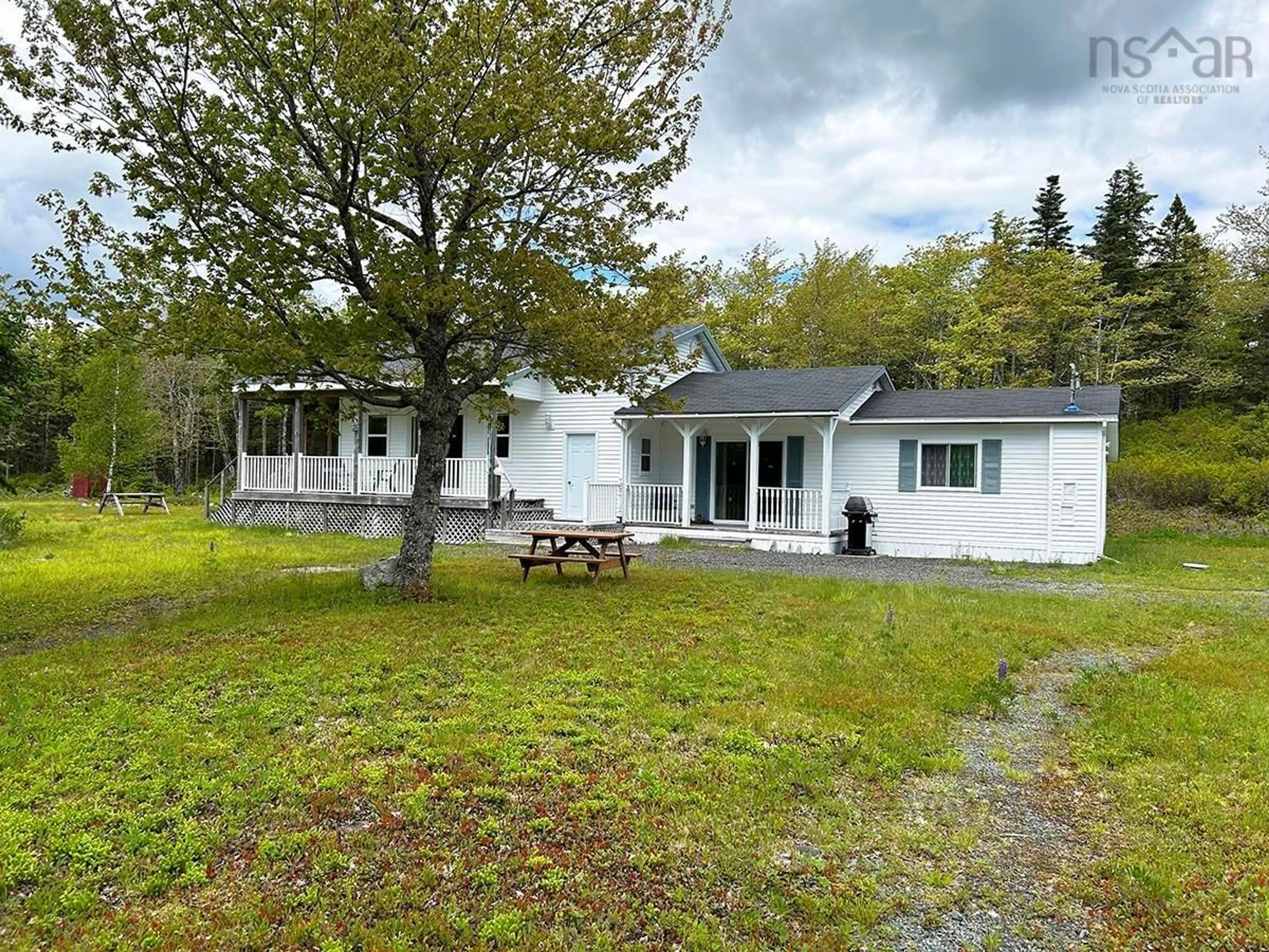 A pic from outside/outdoor area/front of a property/back of a property/a pic from drone, unknown for 87 Somerset Dr, East Sable River Nova Scotia B0T 1V0