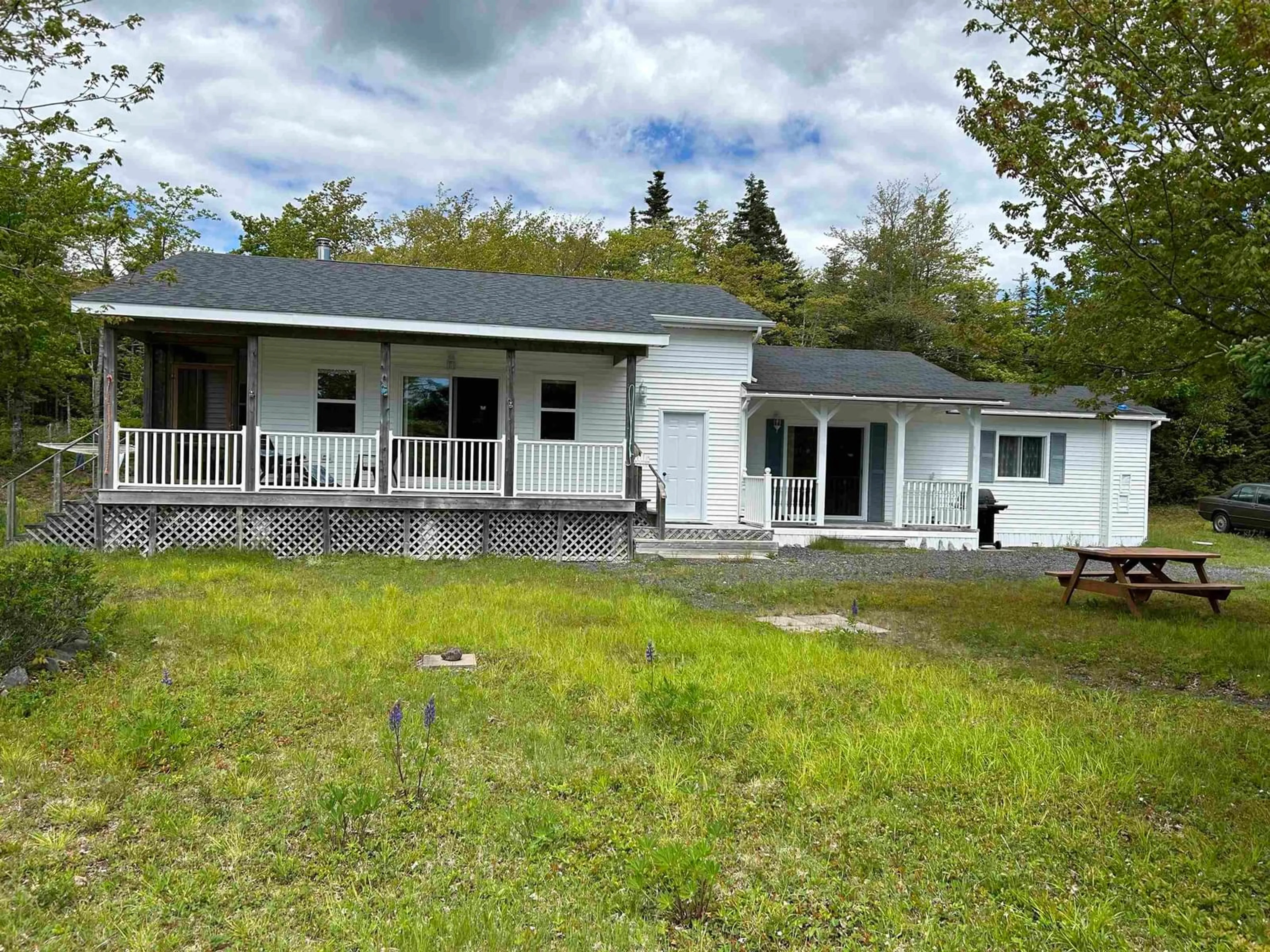 A pic from outside/outdoor area/front of a property/back of a property/a pic from drone, unknown for 87 Somerset Dr, East Sable River Nova Scotia B0T 1V0