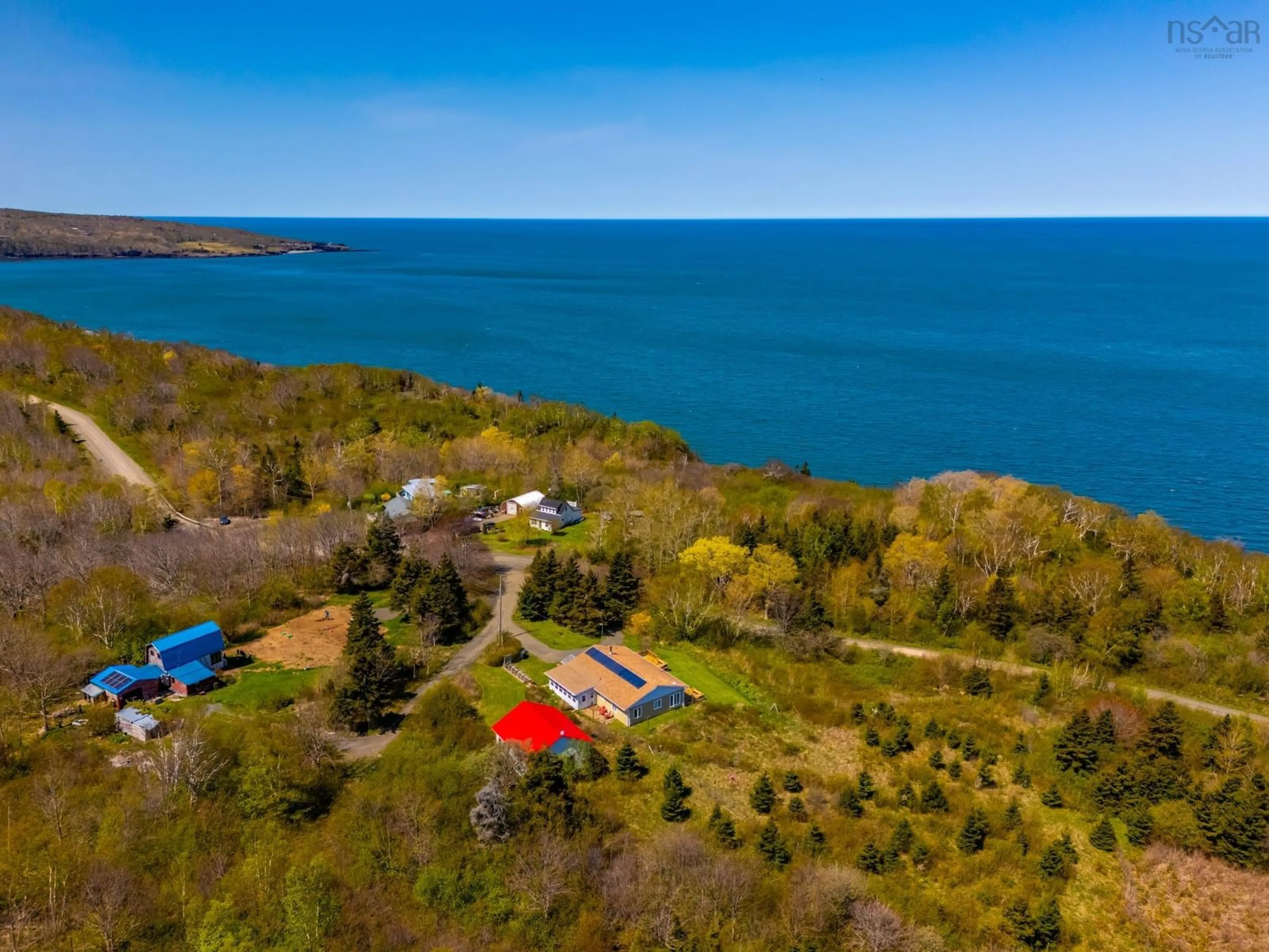 A pic from outside/outdoor area/front of a property/back of a property/a pic from drone, water/lake/river/ocean view for 225 Granville Rd, Victoria Beach Nova Scotia B0S 1A0